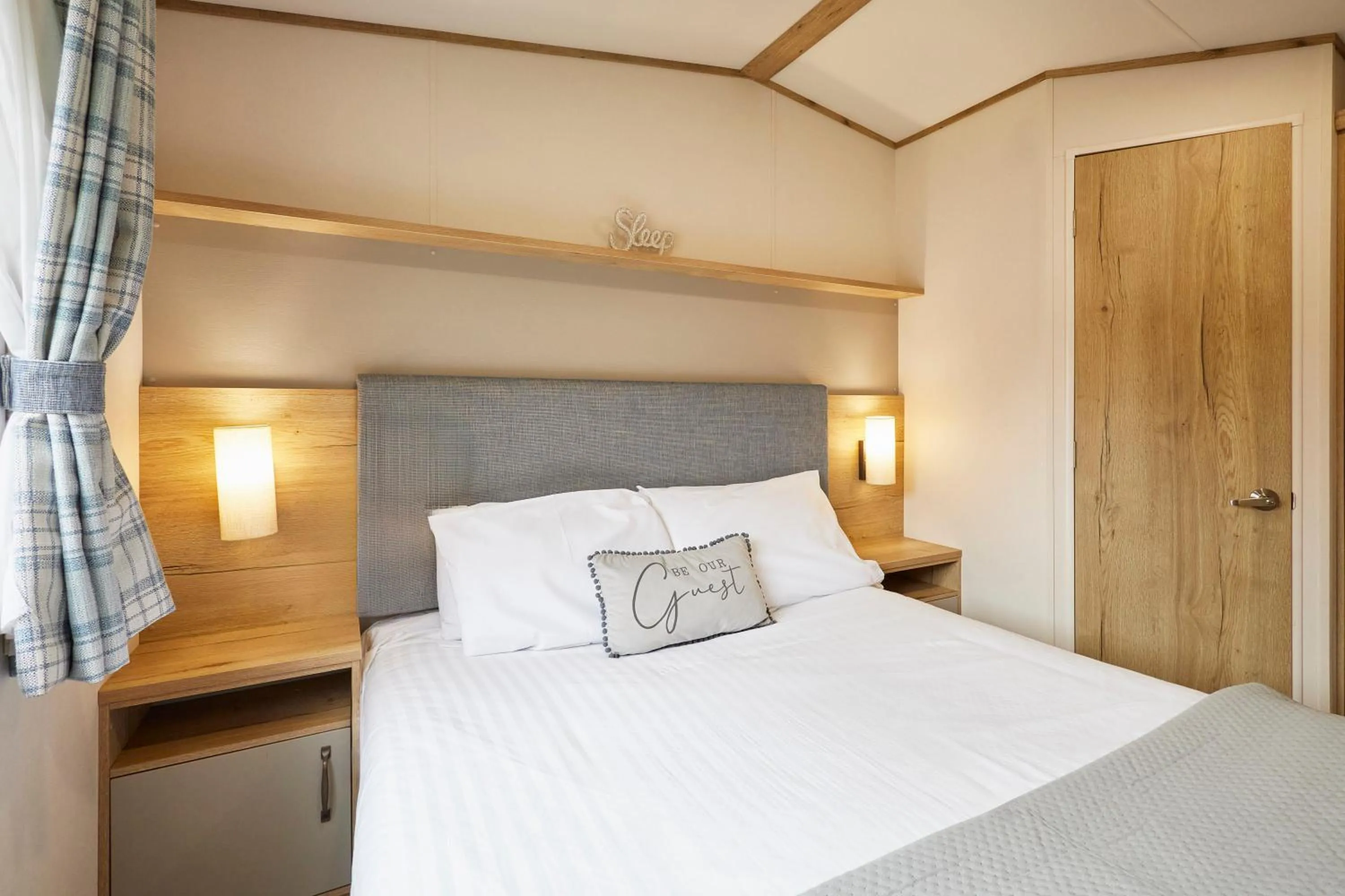 Bed in Squirrel Lodge with Hot Tub