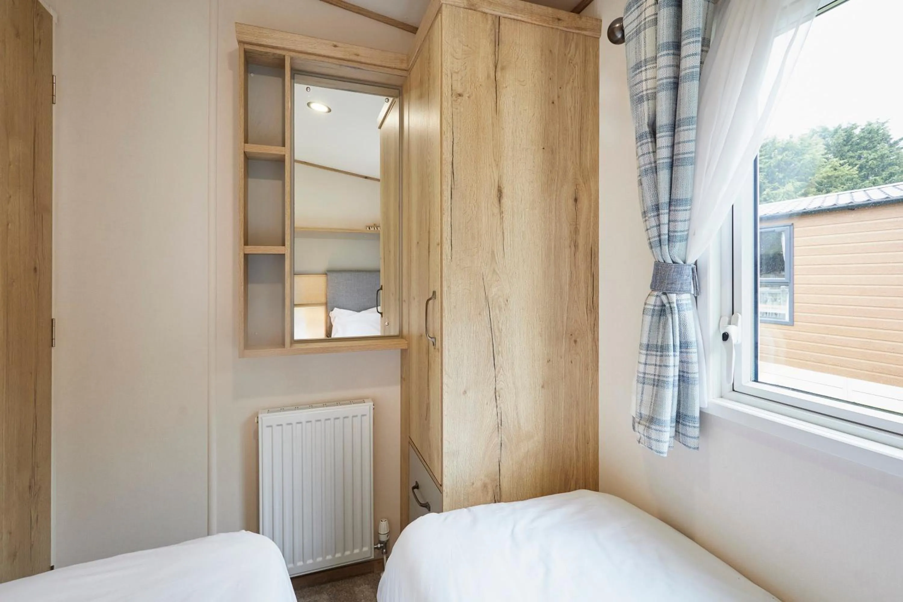 Bed in Squirrel Lodge with Hot Tub