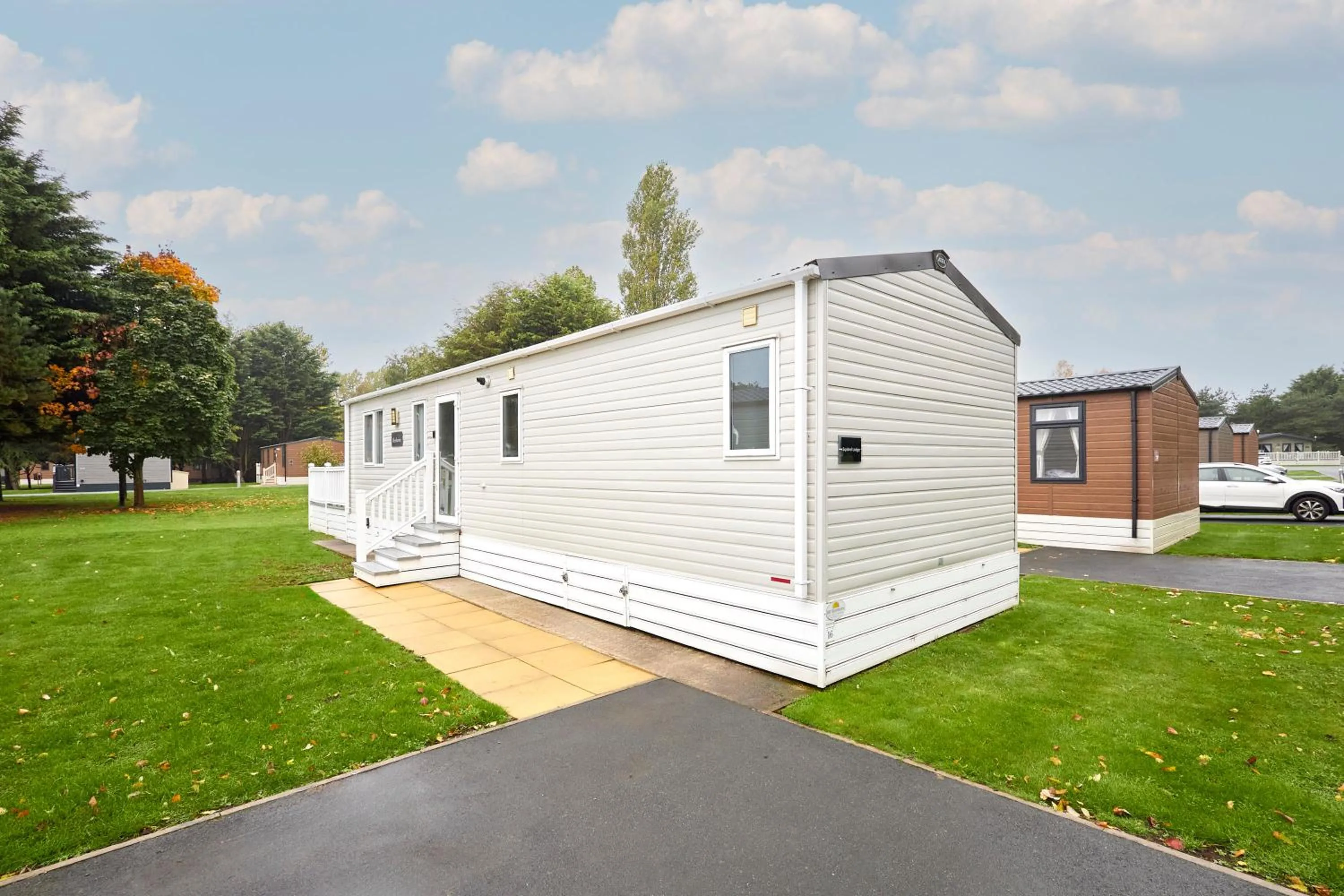 Property building in Squirrel Lodge with Hot Tub