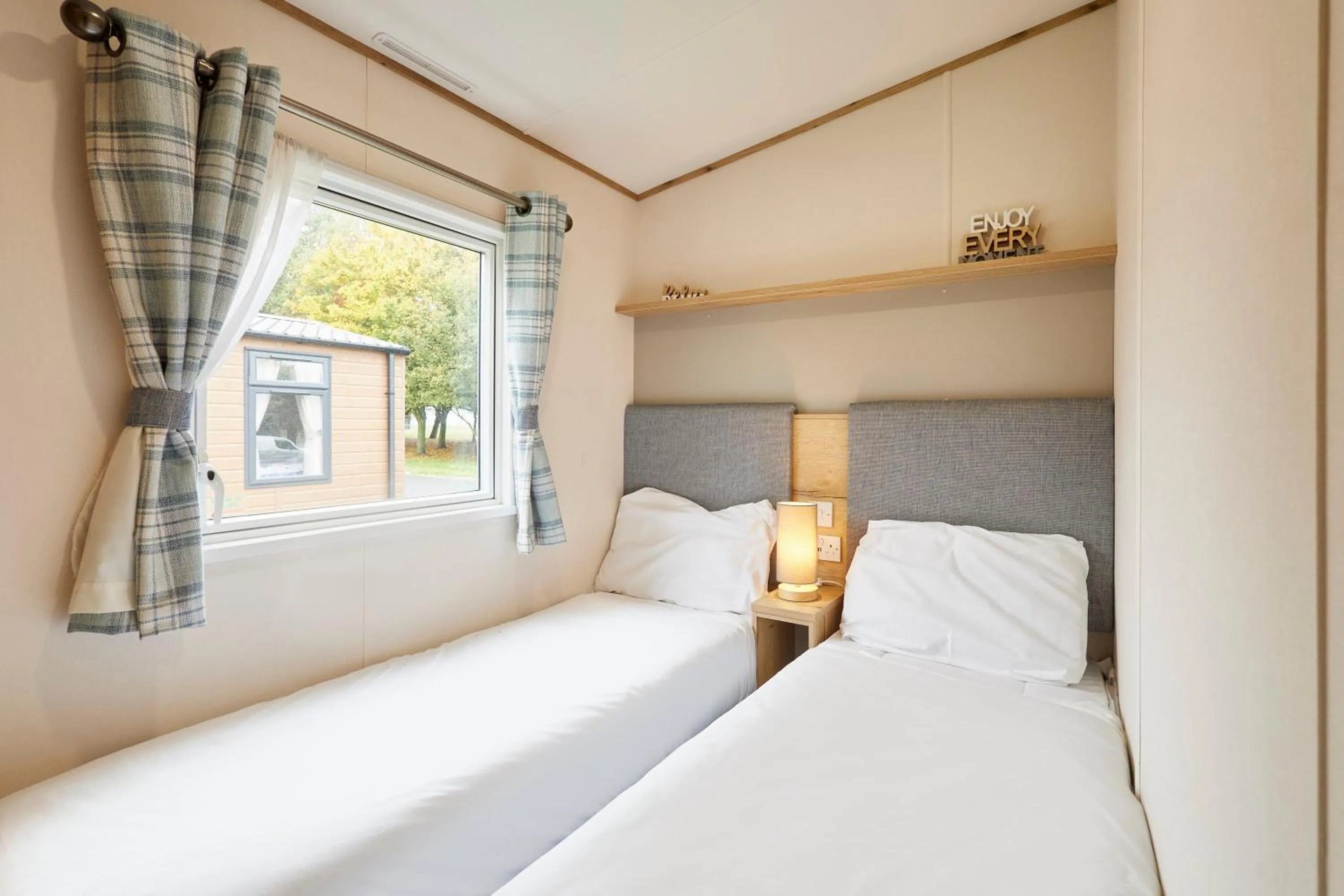 Bed in Squirrel Lodge with Hot Tub