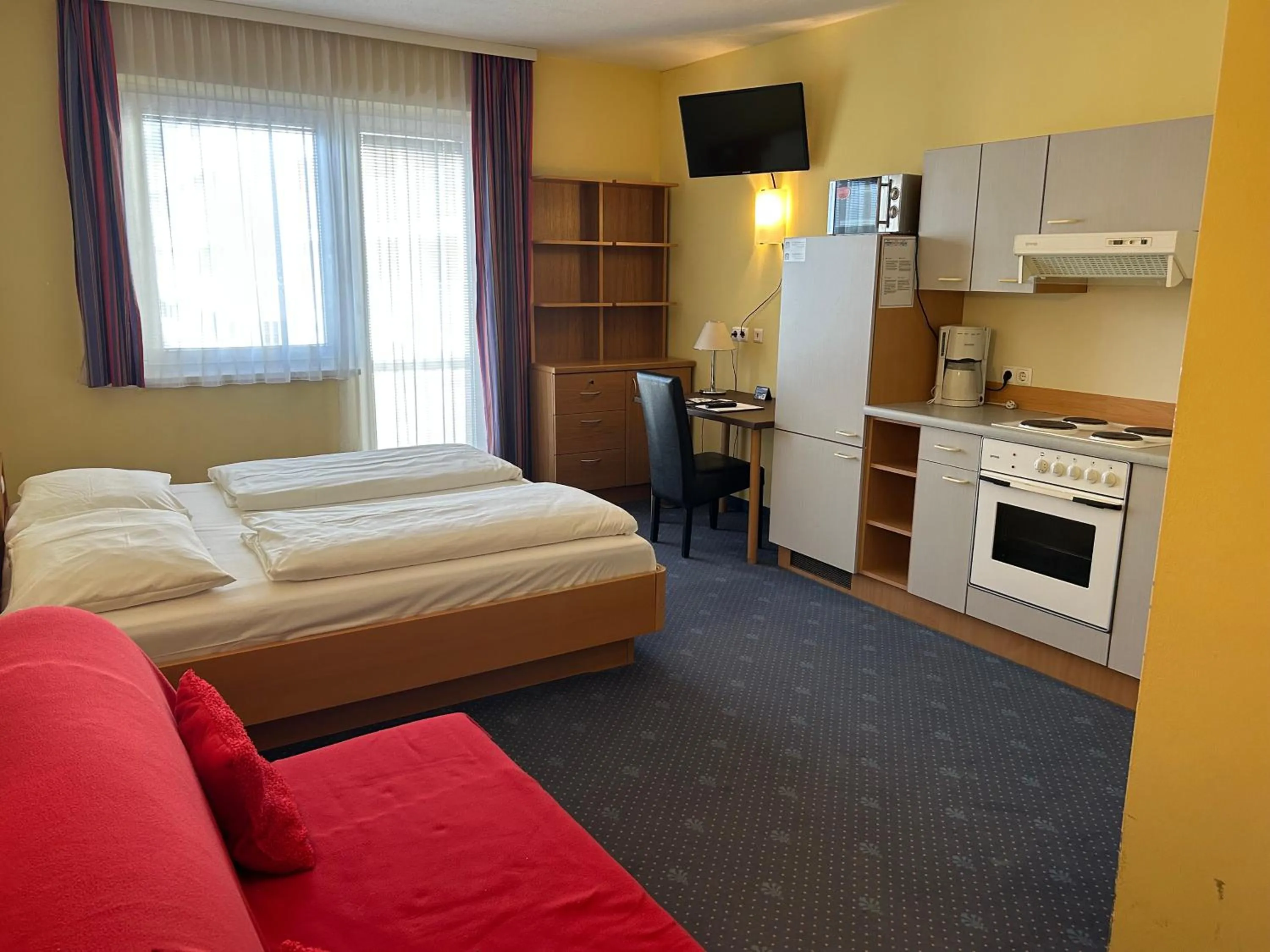 Bed in NOVAPARK Flugzeughotel Graz