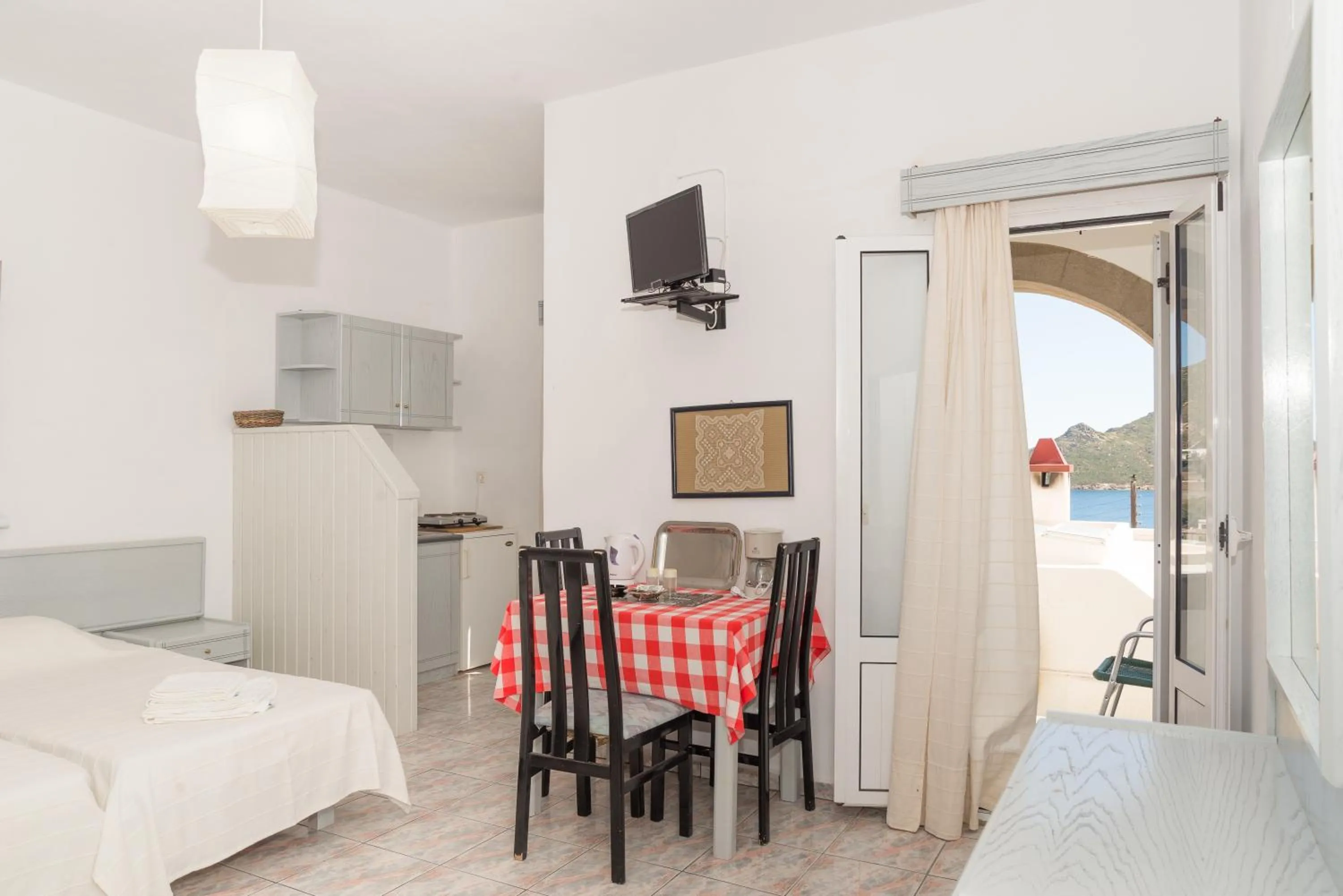 Bed in Captain Manos Studio Apartments