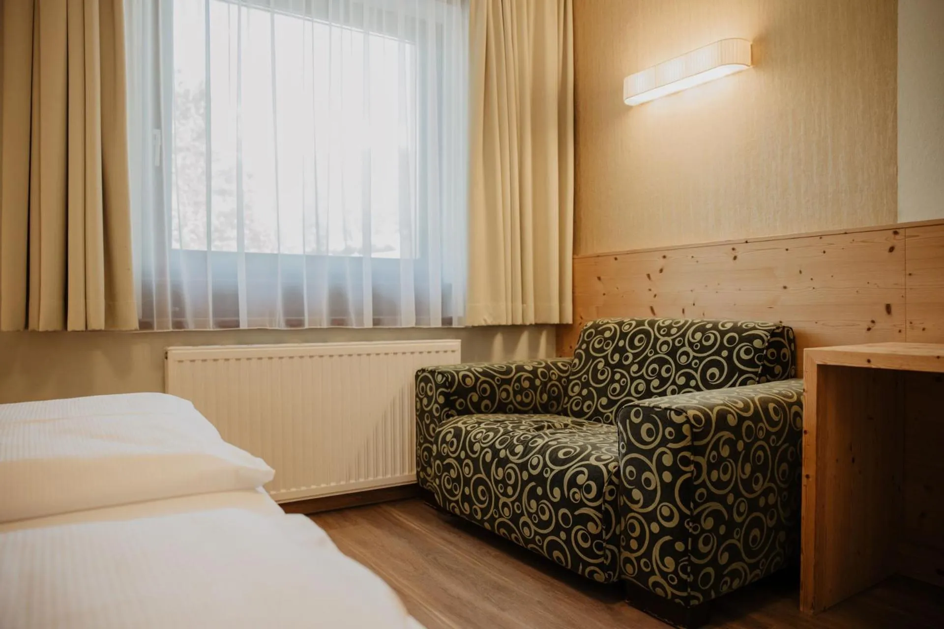 Photo of the whole room, Bed in Parkhotel Matrei