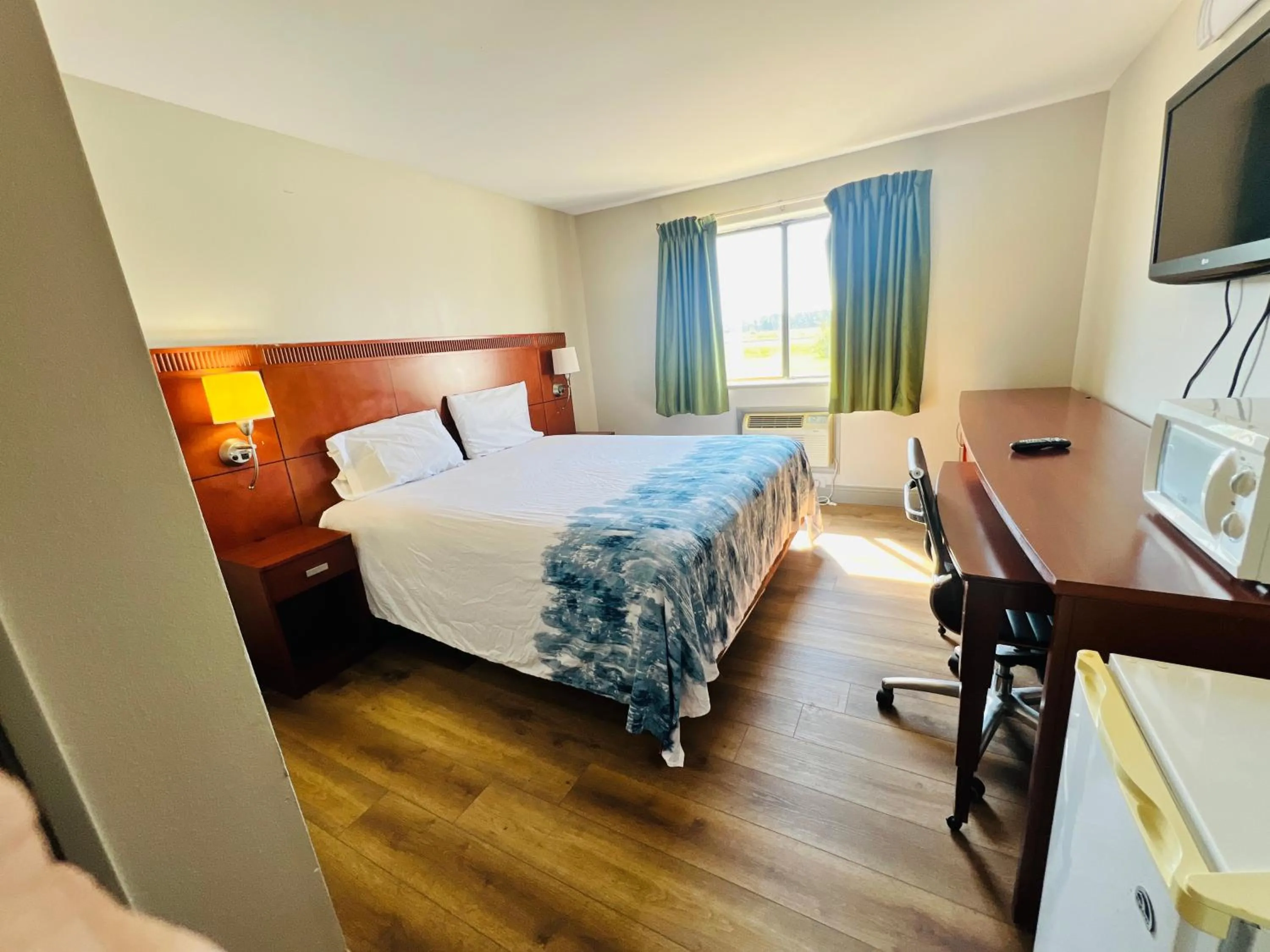 Bedroom in Rosewood Inn By OYO Union City I-69