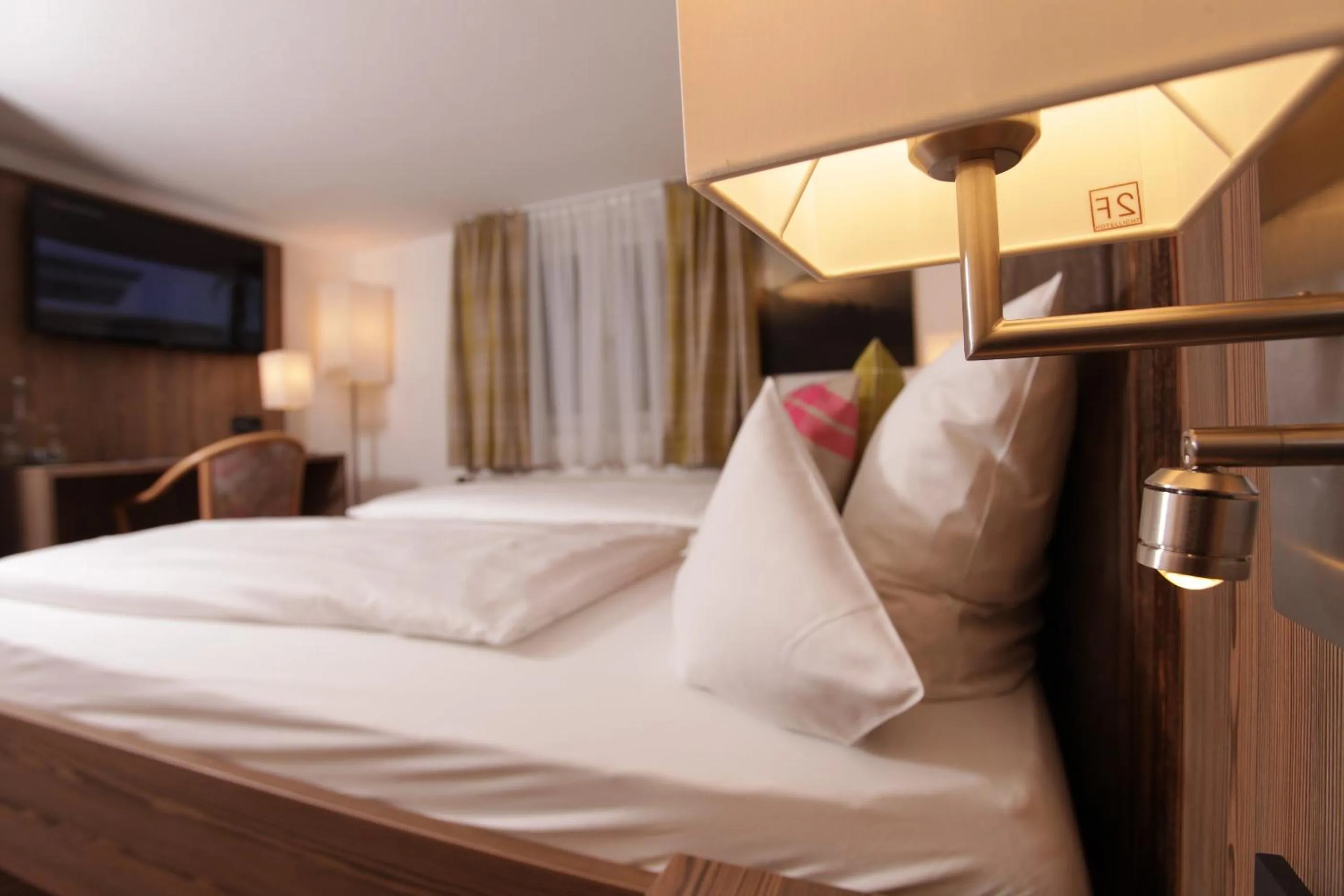 Bed in Genuss- & Aktivhotel Sonnenburg