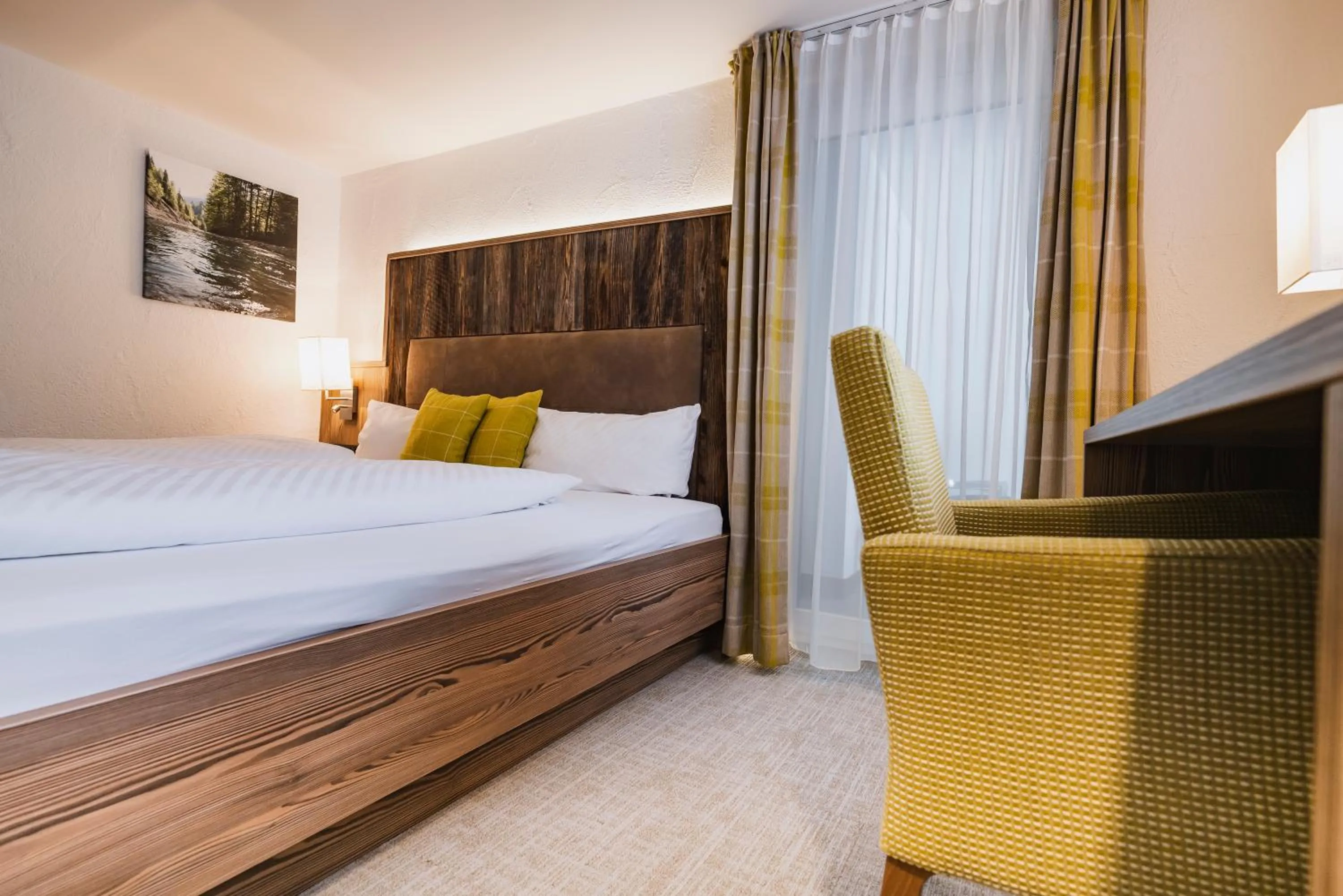 Bed in Genuss- & Aktivhotel Sonnenburg