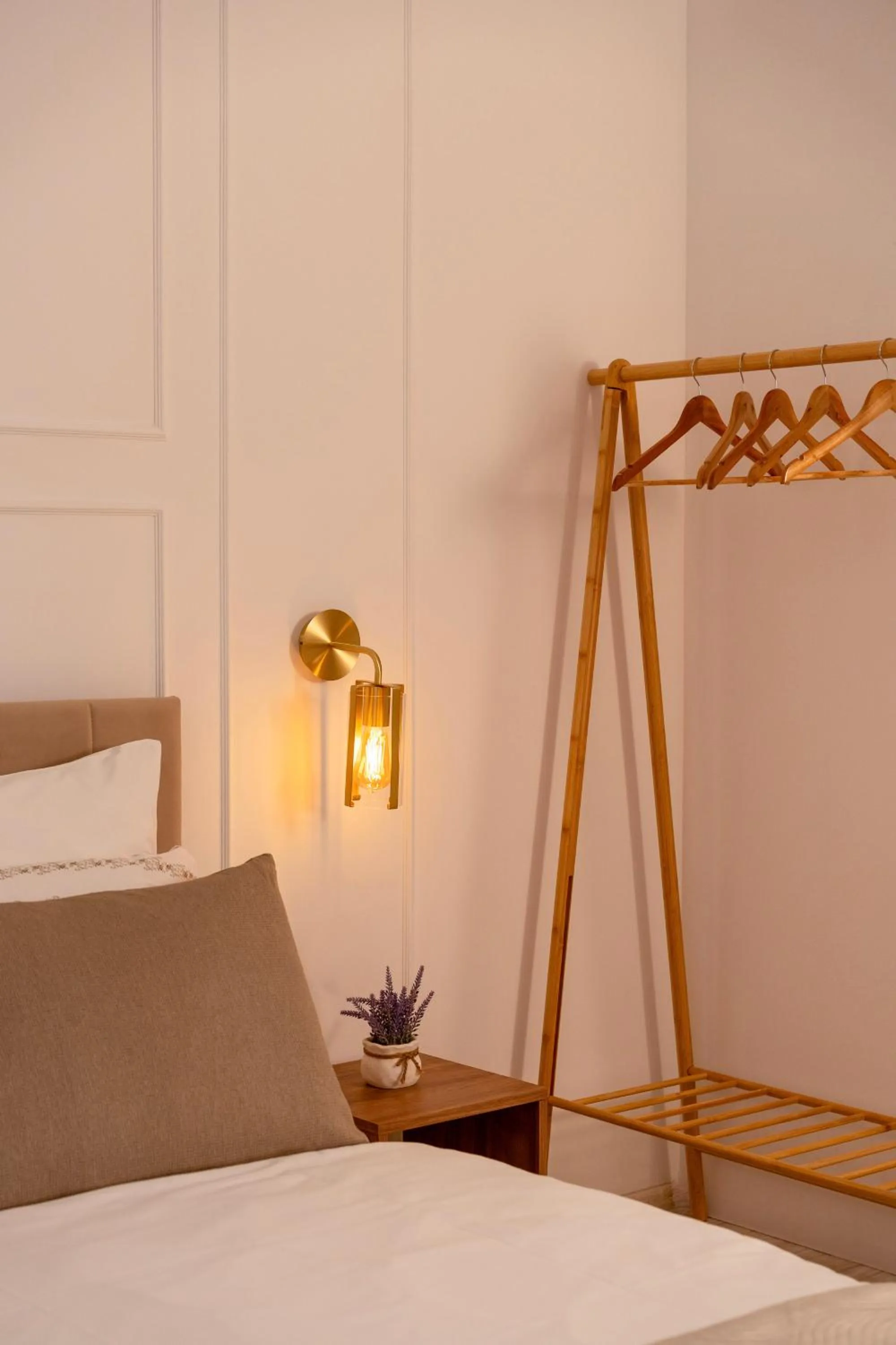 Decorative detail, Bed in Kazimierz Residence Apartments by Staymoovers