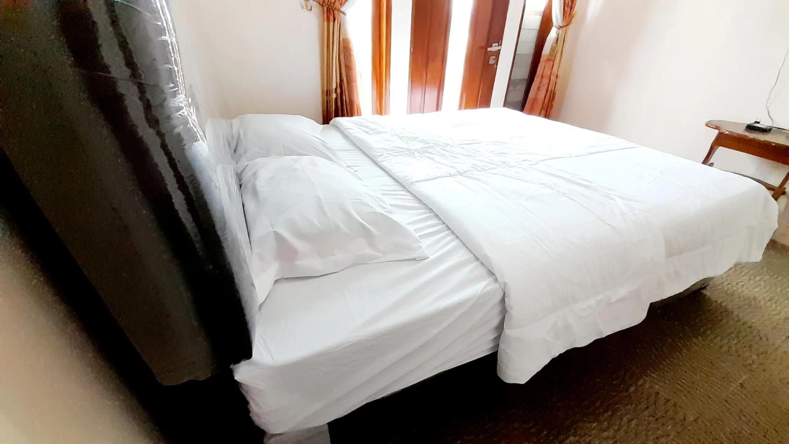 Bed in Homestay Merpati Dieng Syariah RedPartner
