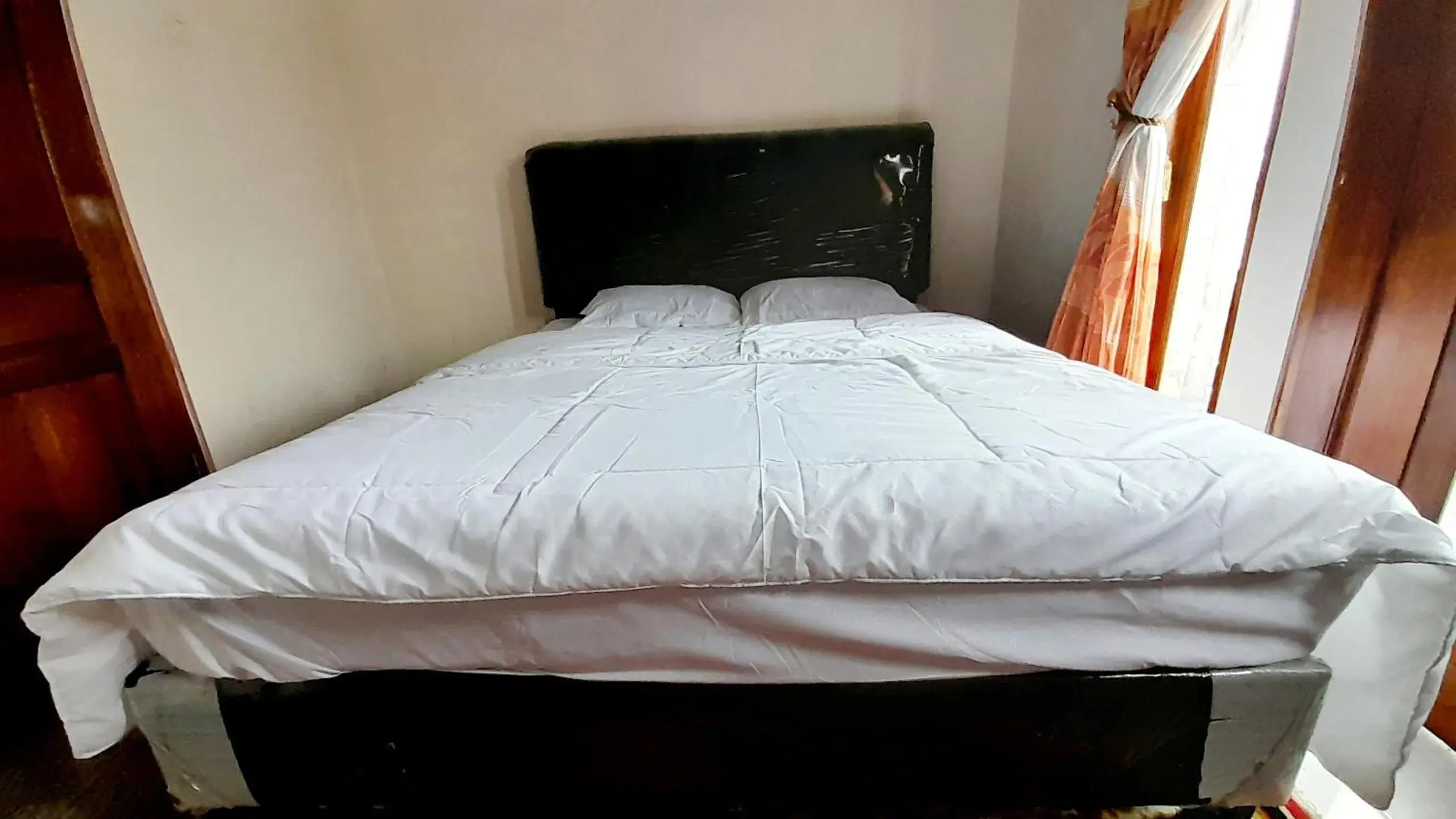 Bed in Homestay Merpati Dieng Syariah RedPartner Bed in Homestay Merpati Dieng Syariah RedPartner