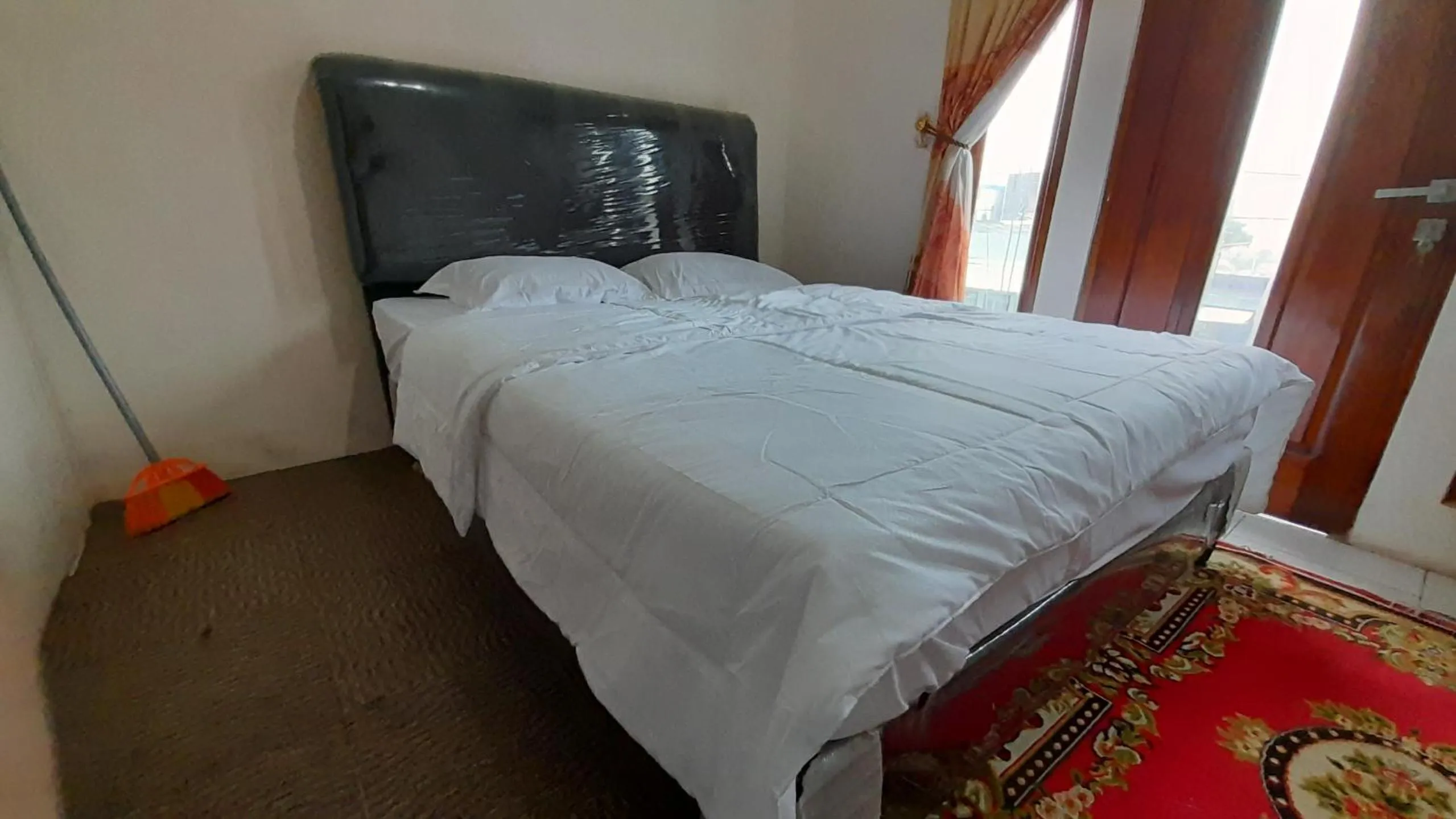 Bed in Homestay Merpati Dieng Syariah RedPartner