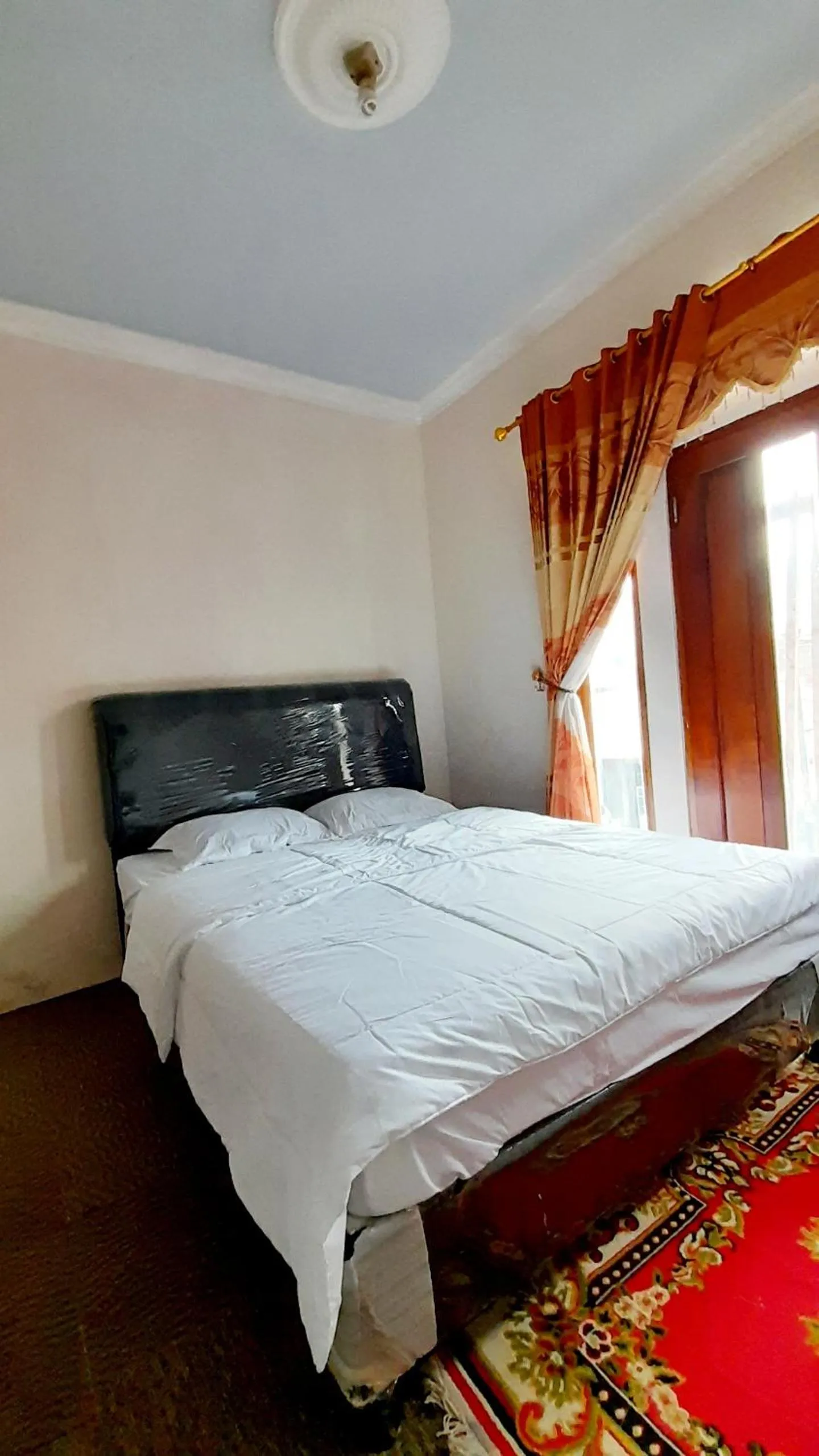 Bed in Homestay Merpati Dieng Syariah RedPartner