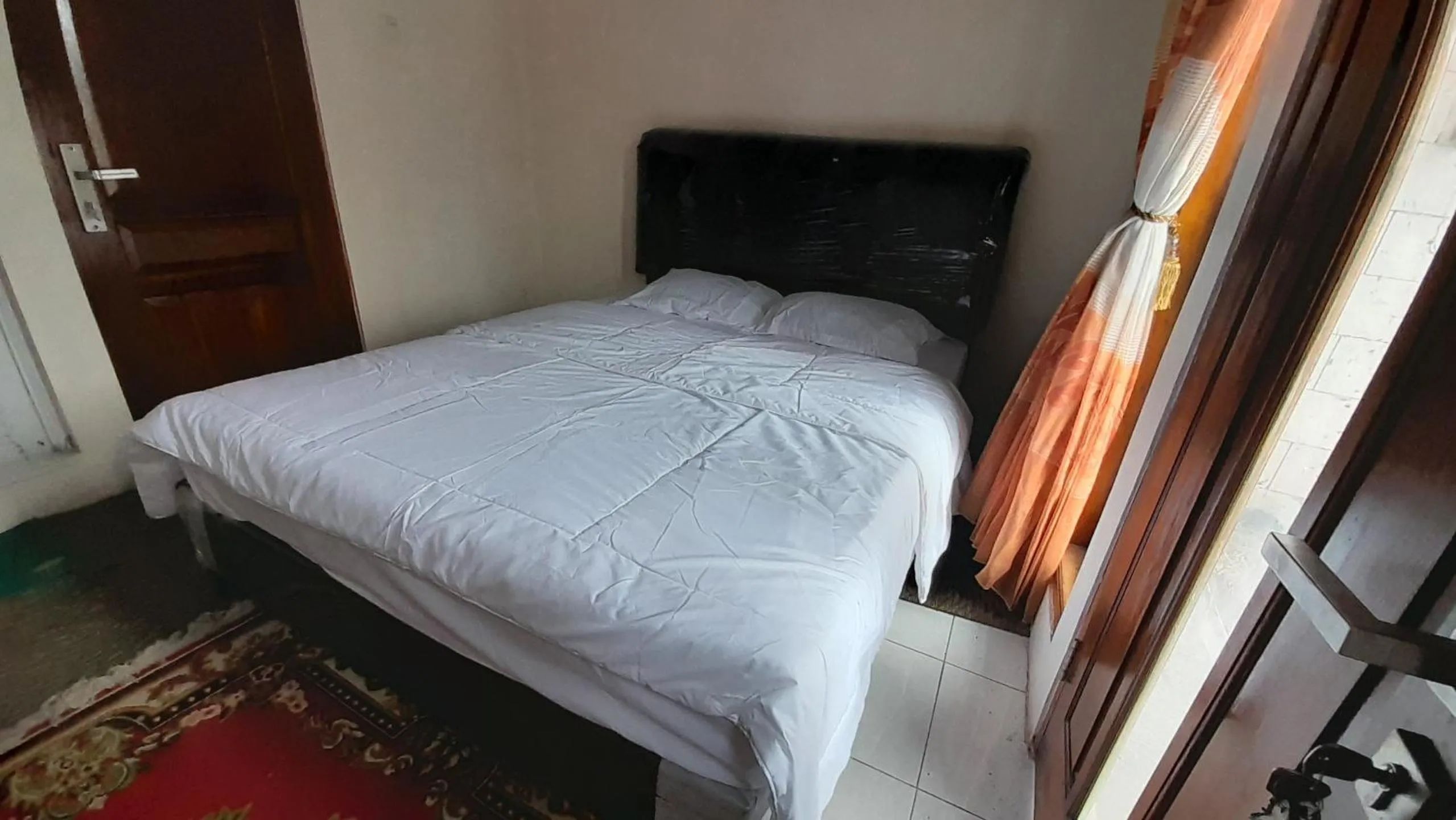 Bed in Homestay Merpati Dieng Syariah RedPartner