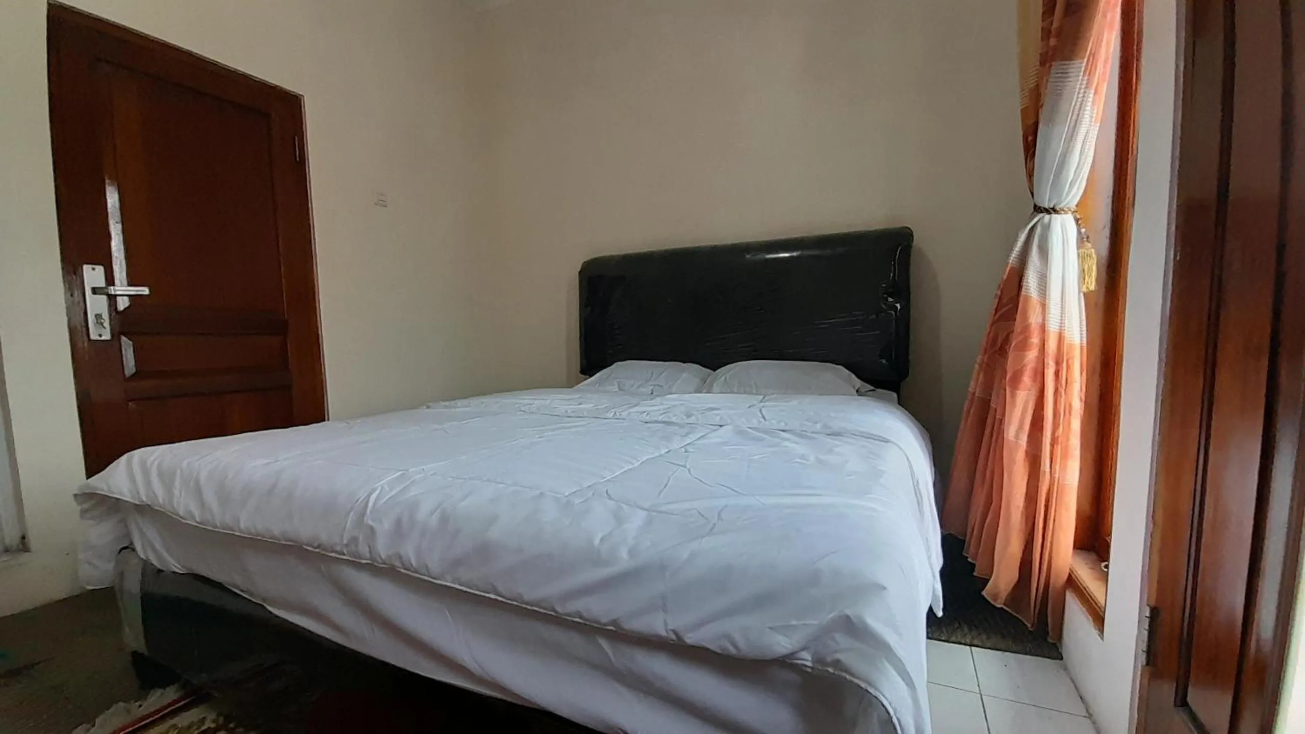 Bed in Homestay Merpati Dieng Syariah RedPartner