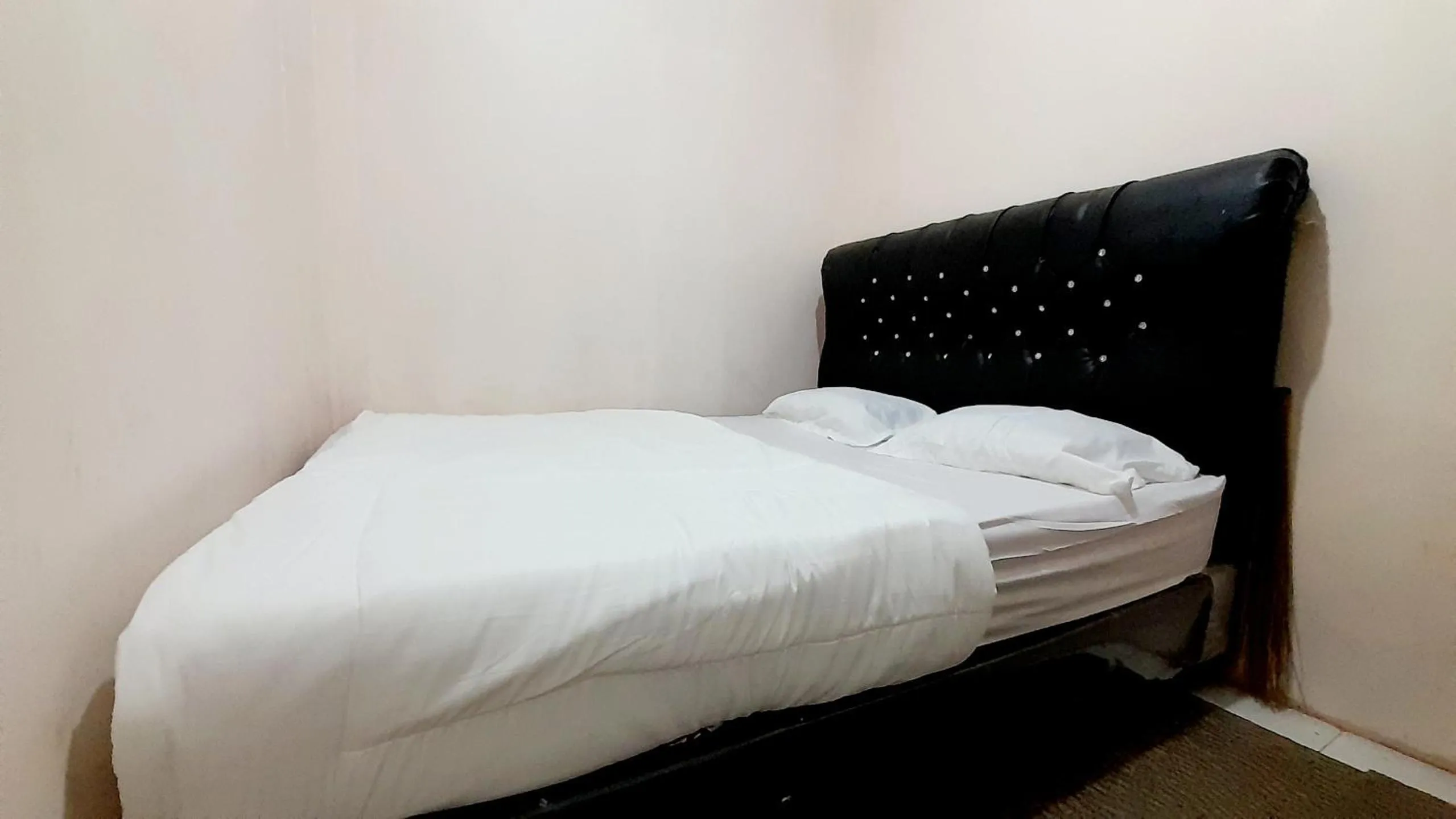 Bed in Homestay Merpati Dieng Syariah RedPartner