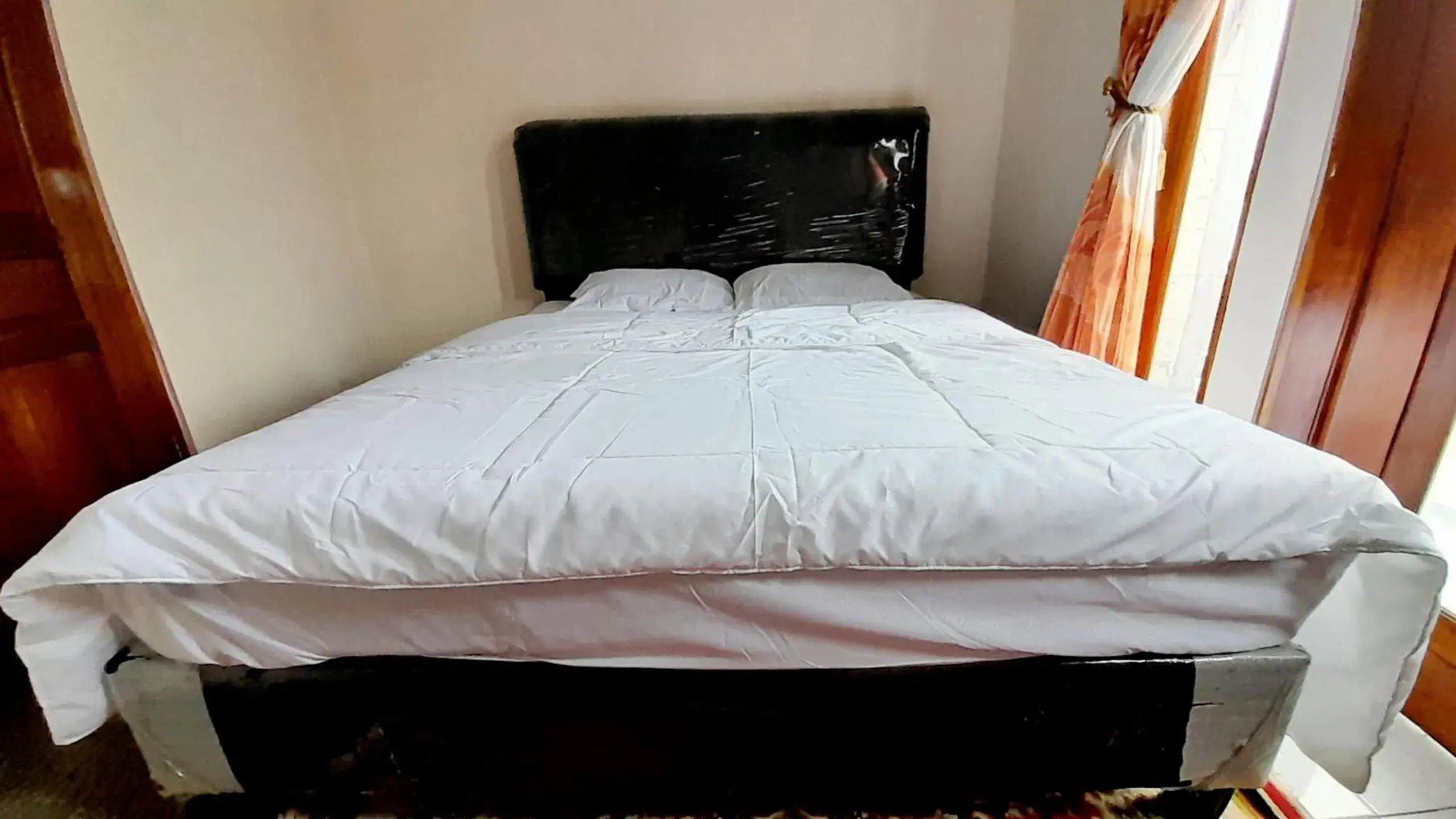Bed in Homestay Merpati Dieng Syariah RedPartner Bed in Homestay Merpati Dieng Syariah RedPartner