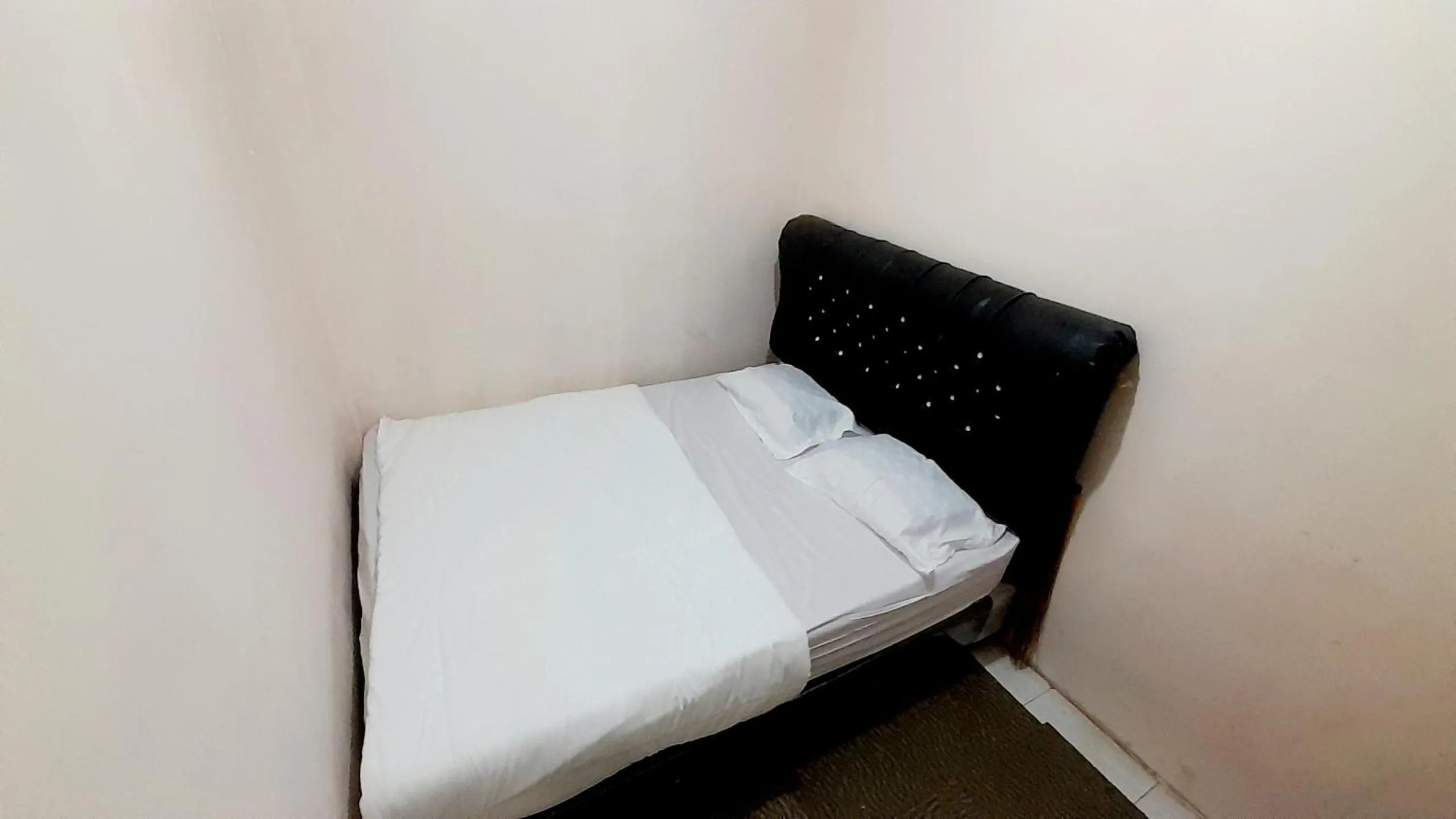 Bed in Homestay Merpati Dieng Syariah RedPartner