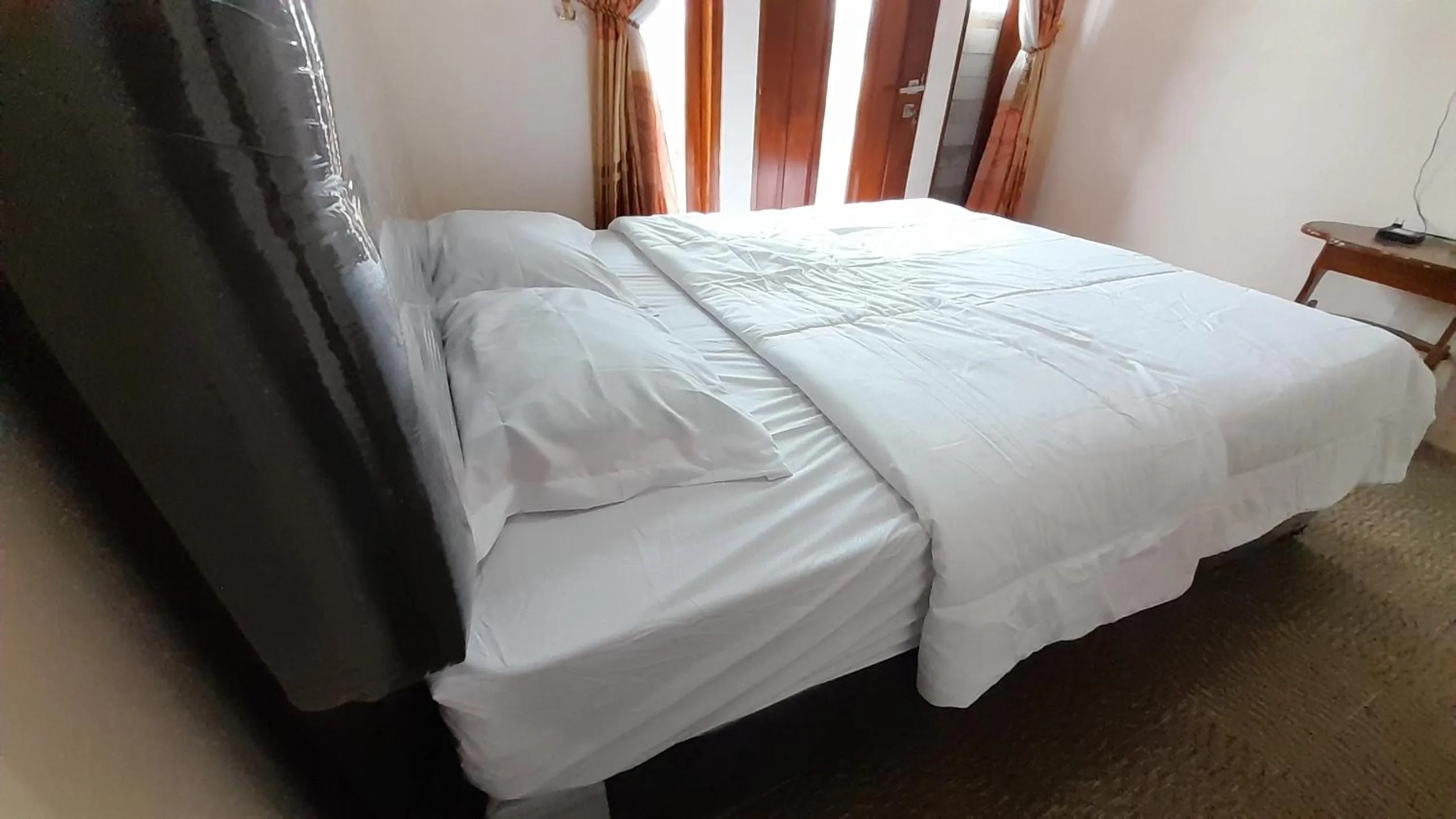 Bed in Homestay Merpati Dieng Syariah RedPartner