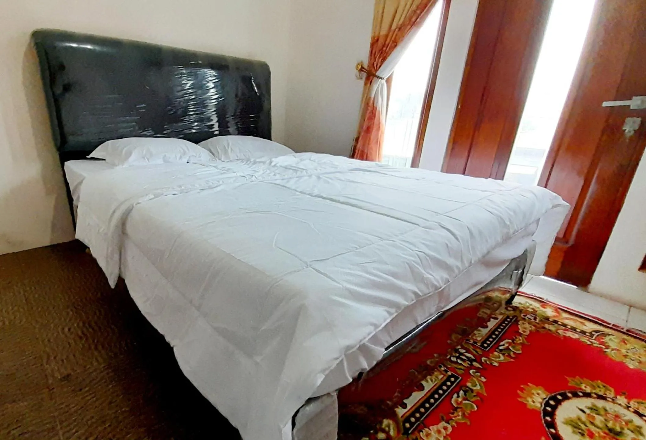Bed in Homestay Merpati Dieng Syariah RedPartner