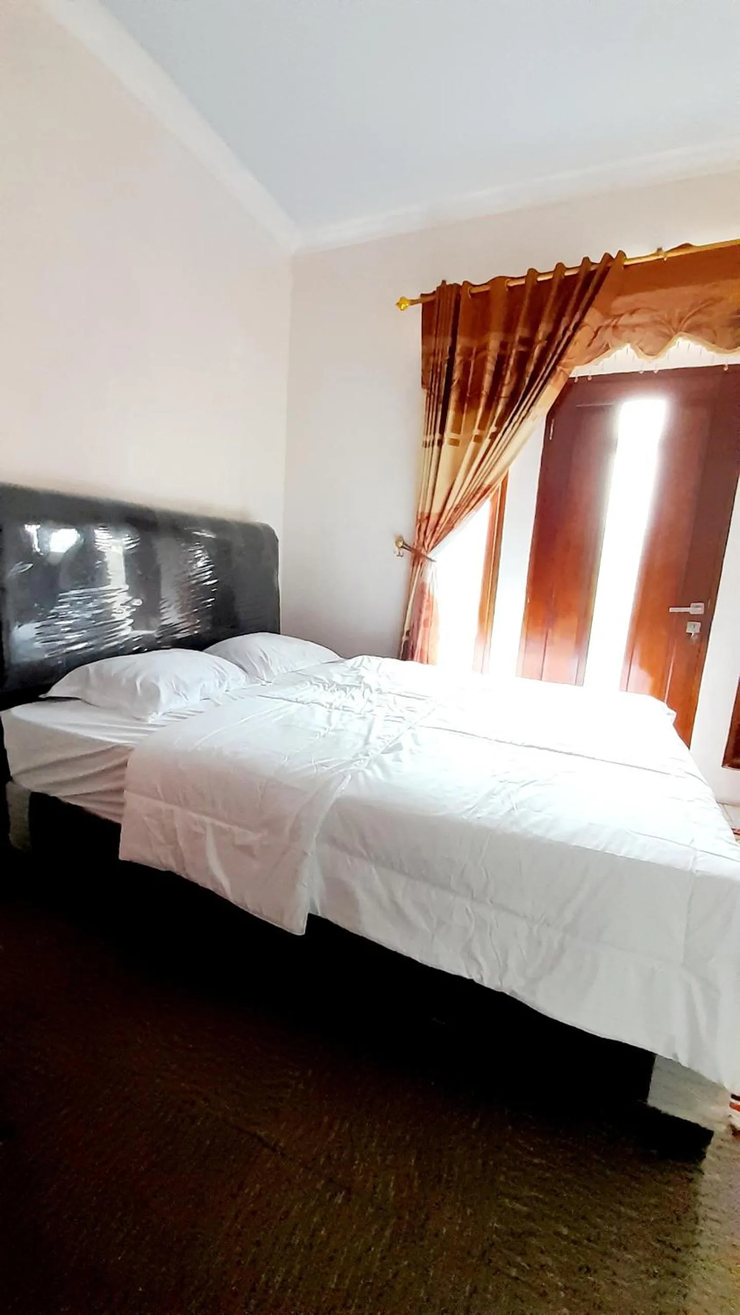 Bed in Homestay Merpati Dieng Syariah RedPartner