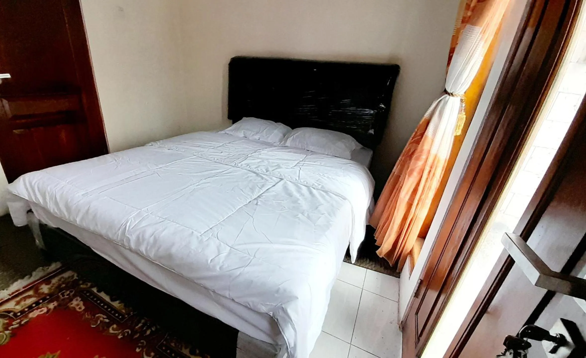 Bed in Homestay Merpati Dieng Syariah RedPartner