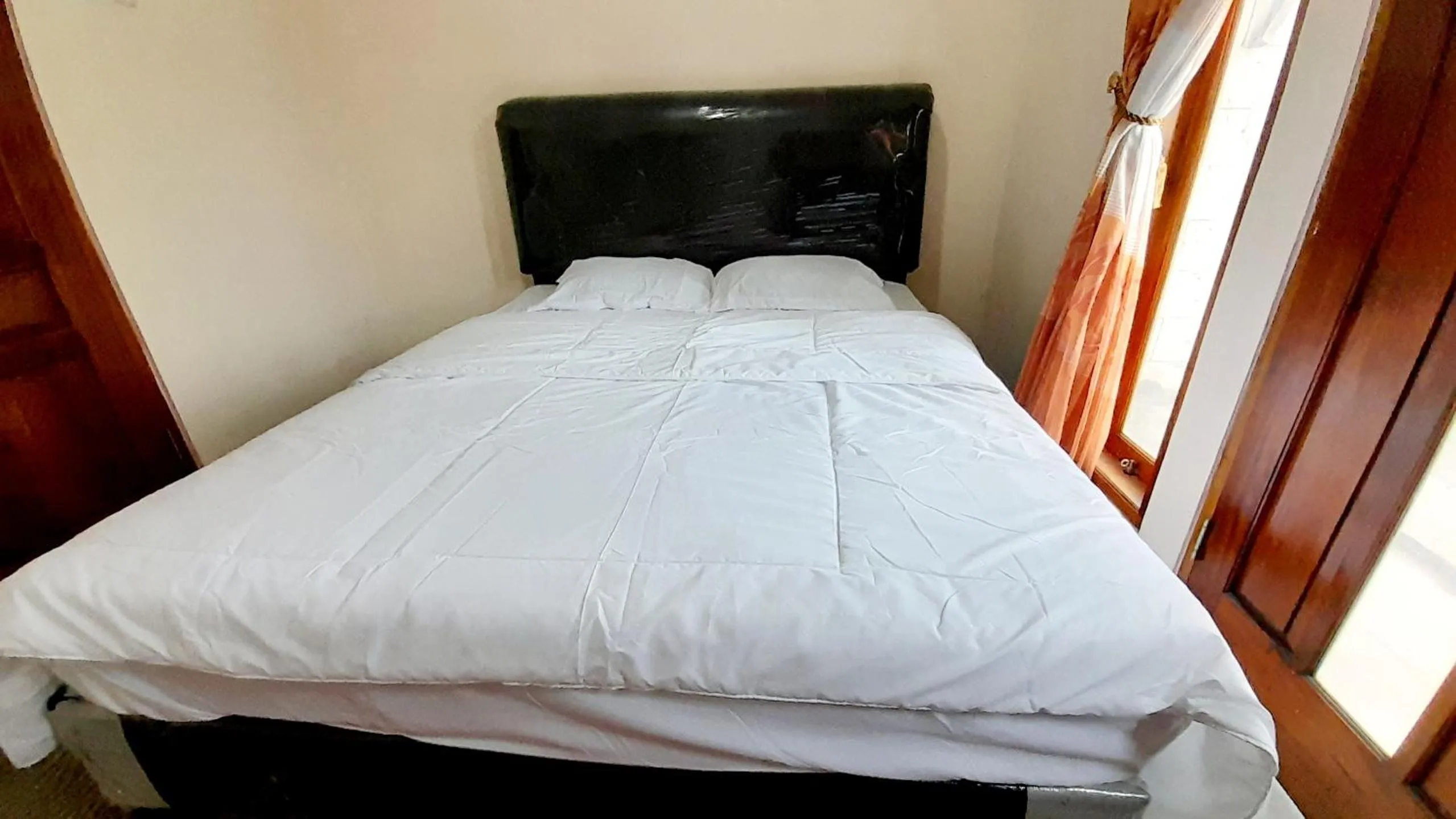 Bed in Homestay Merpati Dieng Syariah RedPartner