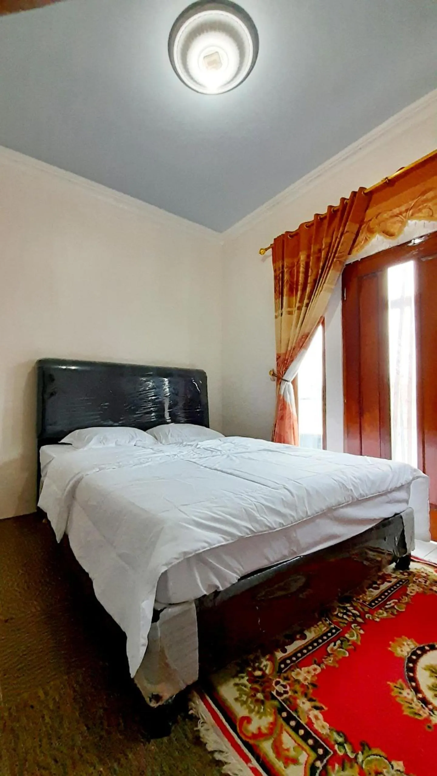 Bed in Homestay Merpati Dieng Syariah RedPartner