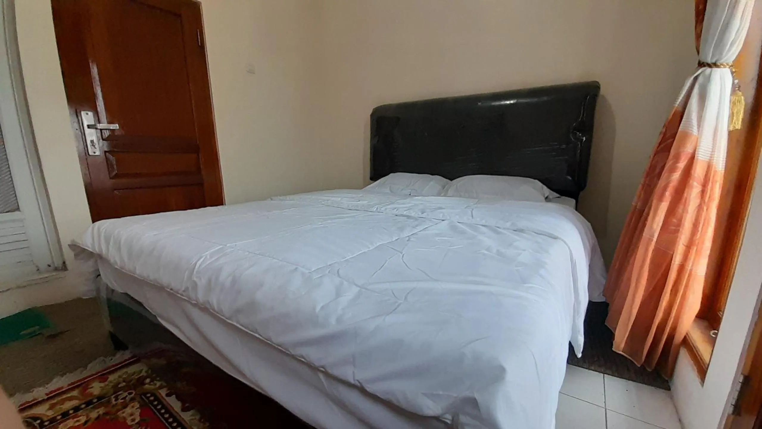 Bed in Homestay Merpati Dieng Syariah RedPartner