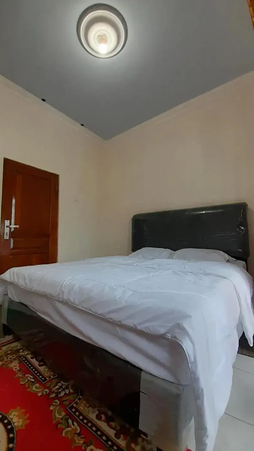 Family Room in Homestay Merpati Dieng Syariah RedPartner Family Room in Homestay Merpati Dieng Syariah RedPartner