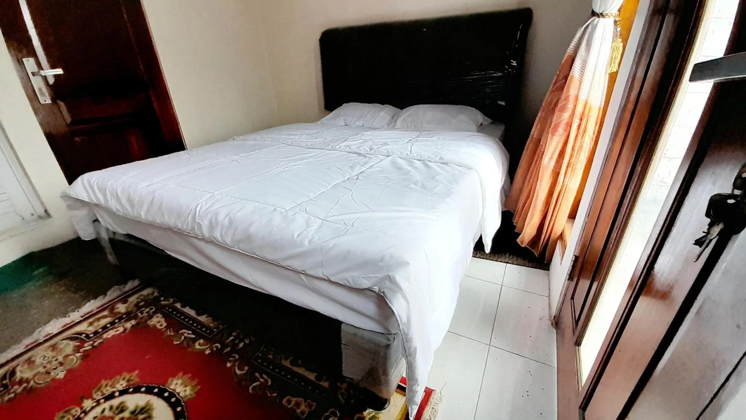 Bed in Homestay Merpati Dieng Syariah RedPartner
