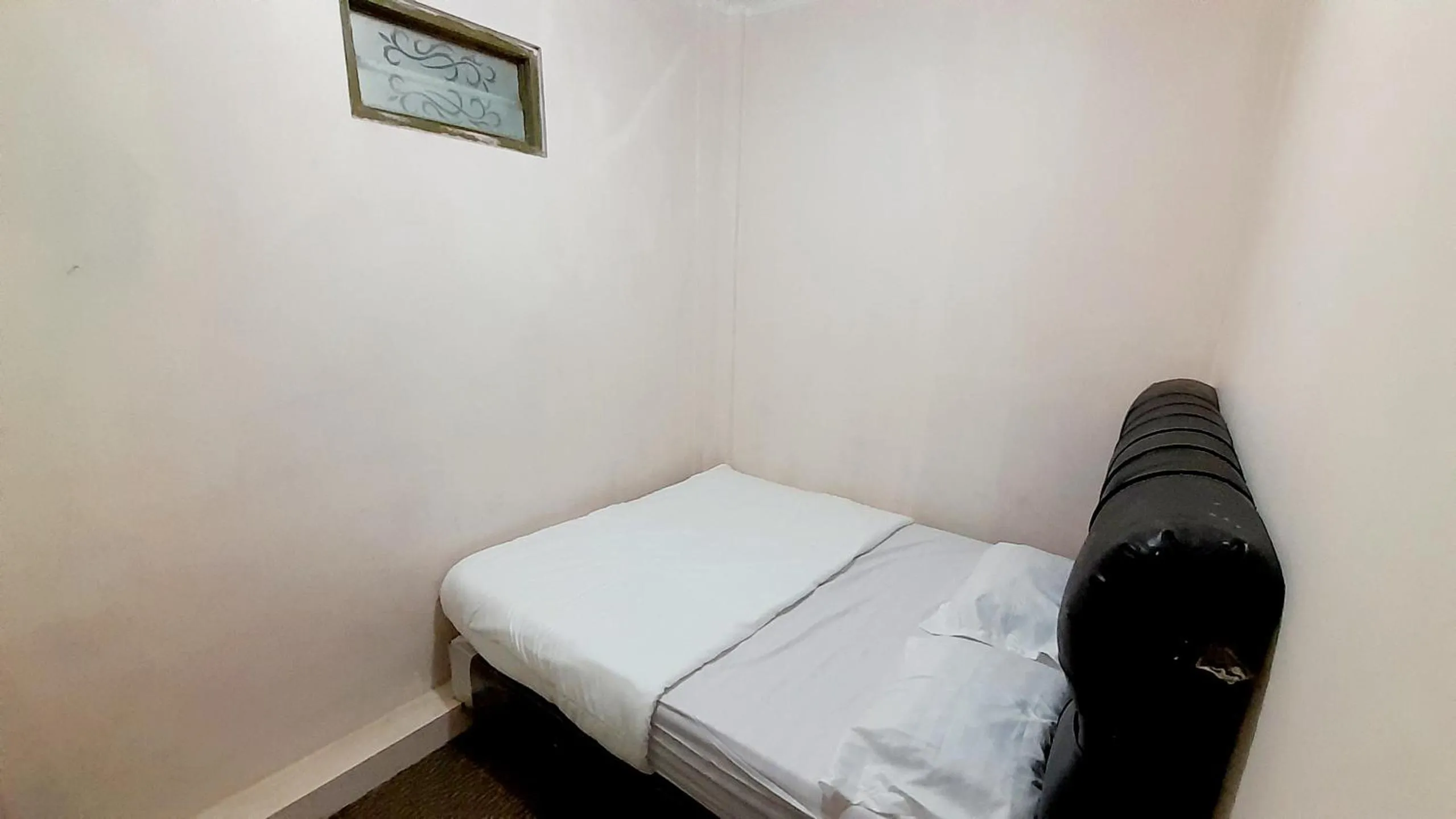 Bed in Homestay Merpati Dieng Syariah RedPartner