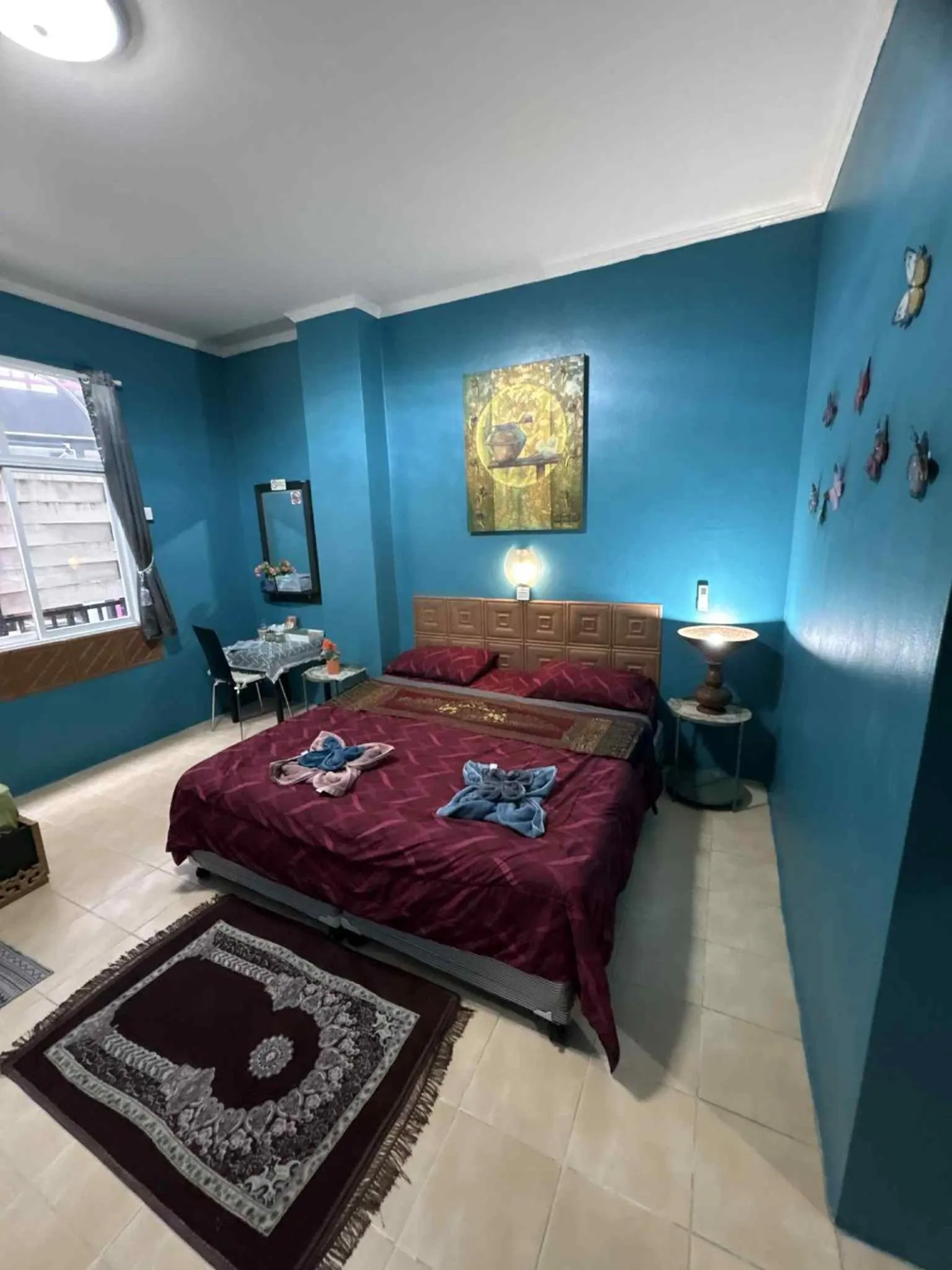 Bed in San Antonio Beach Guesthouse & Restaurant