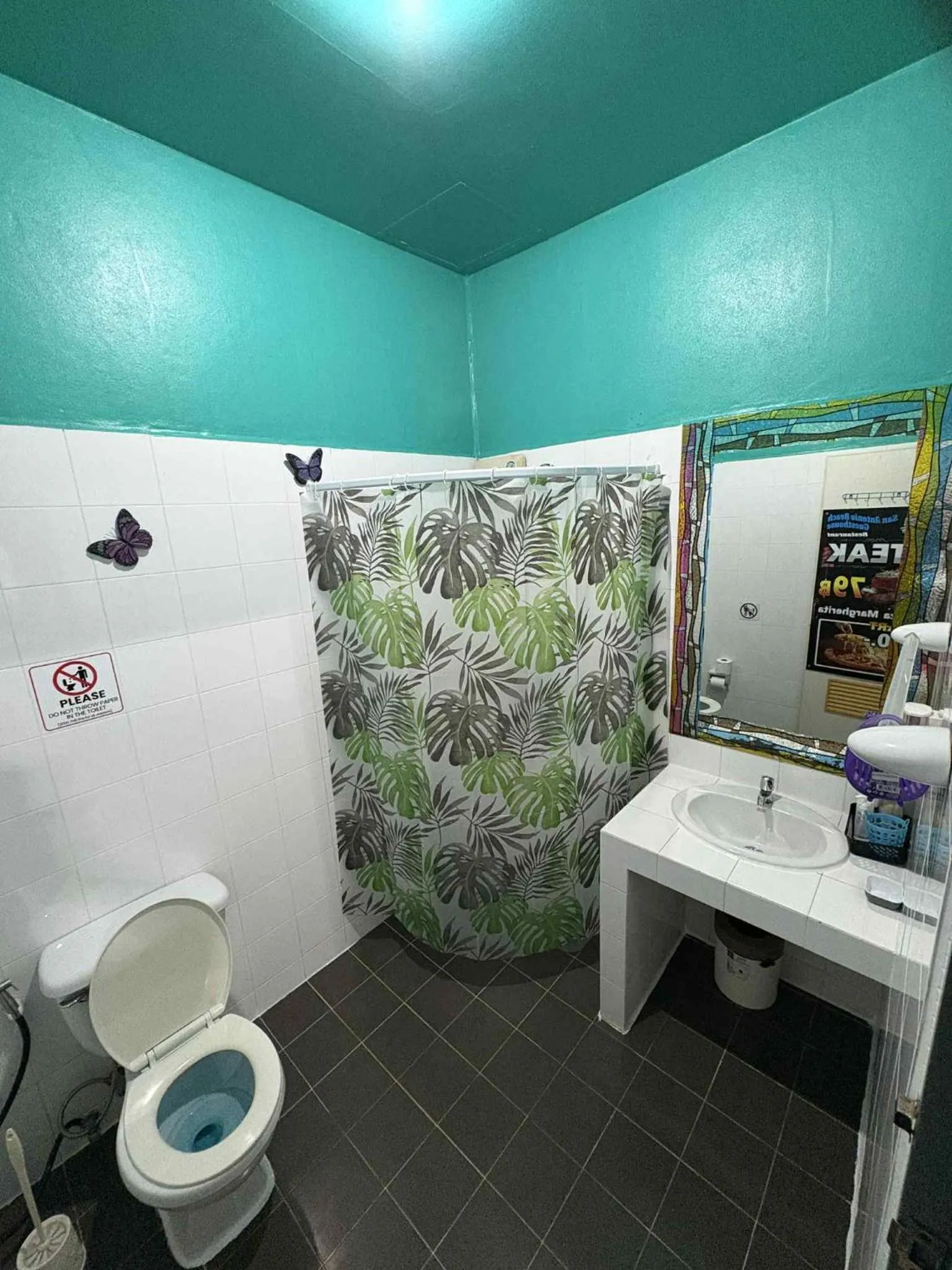 Toilet in San Antonio Beach Guesthouse & Restaurant