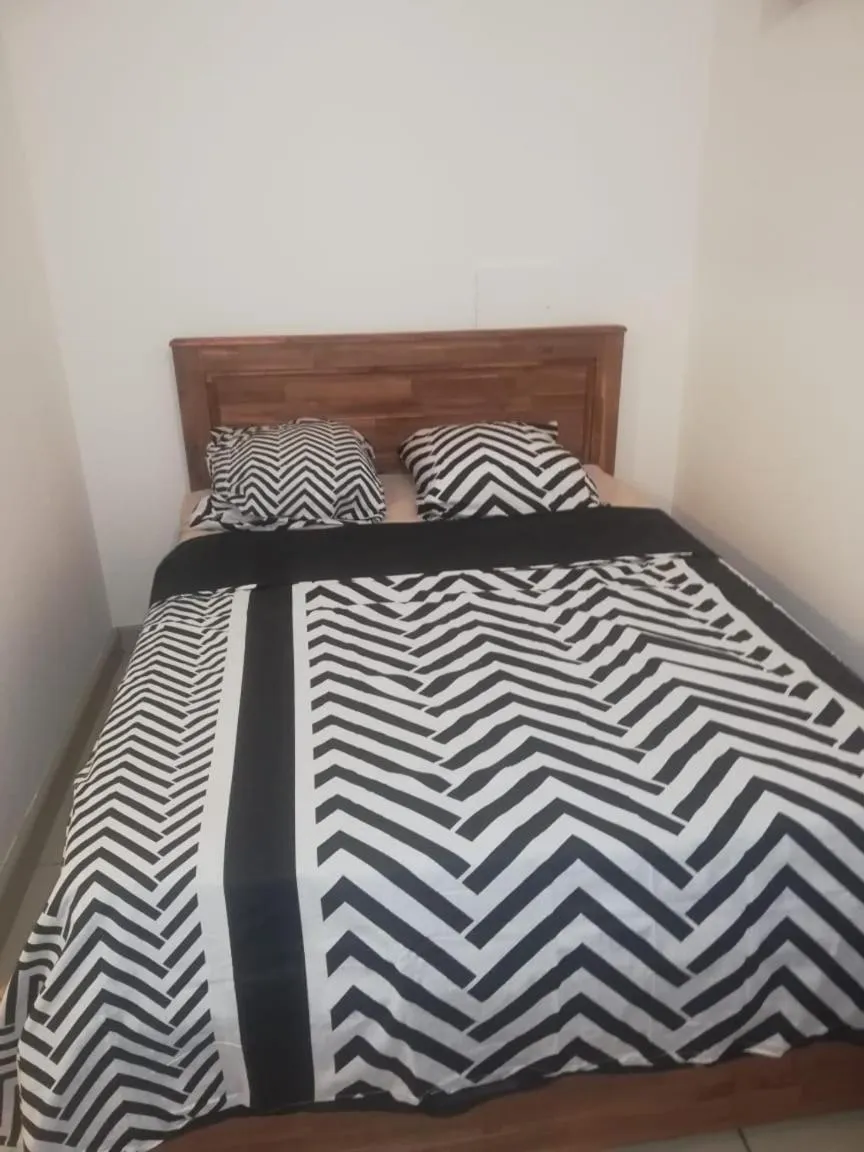 Bed in Appart Alexina, 2mn à pieds de la plage de BOUCAN-CANOT