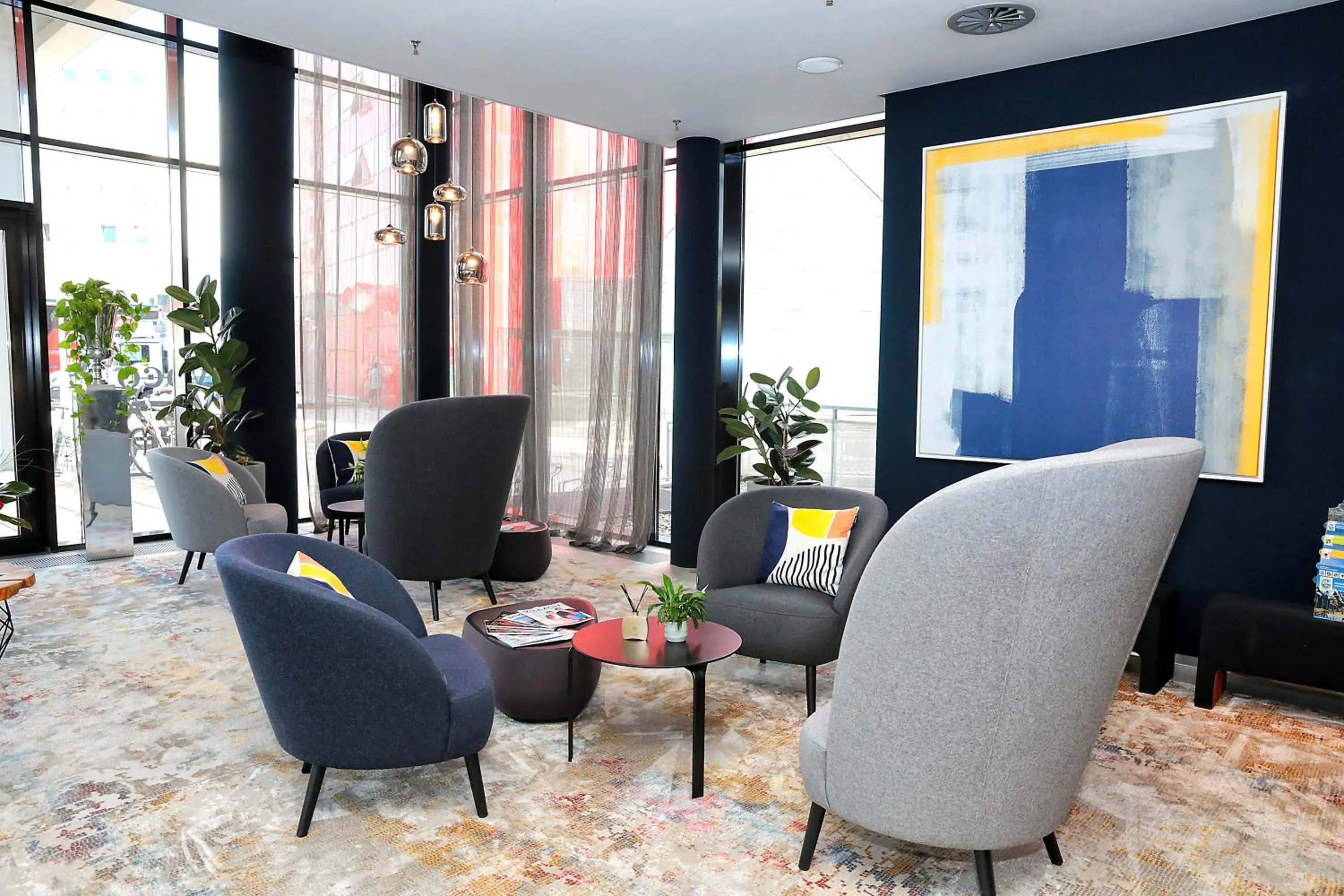 Lobby or reception in voco Villach by IHG Lobby or reception in voco Villach by IHG