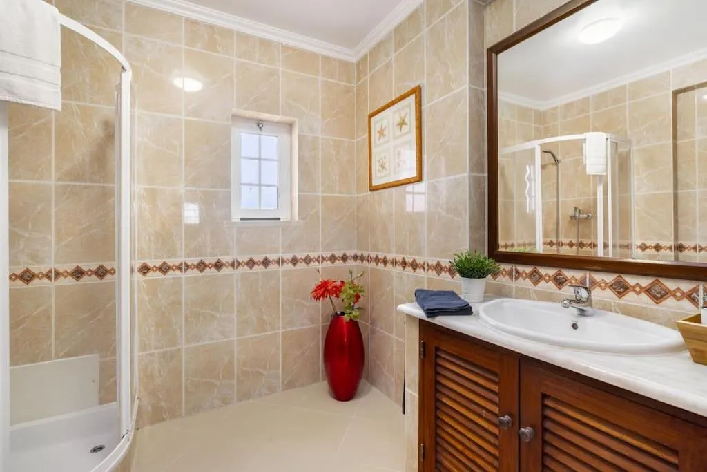 Shower in Villa Arade Riverside - Jacuzzi and Heated Pool by AlgarStays