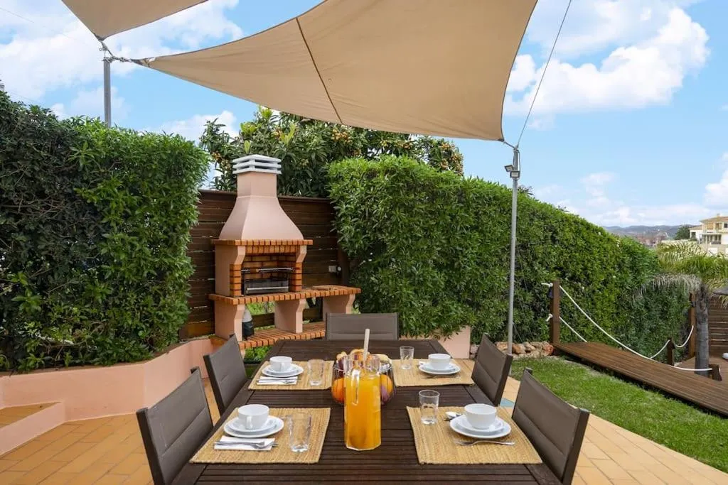 Patio in Villa Arade Riverside - Jacuzzi and Heated Pool by AlgarStays