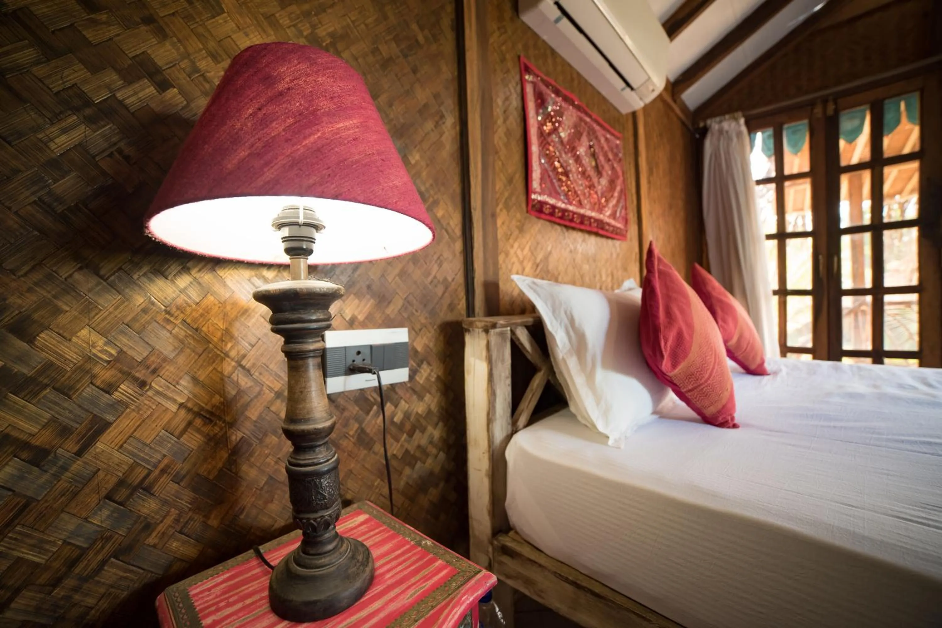 Decorative detail, Bed in Little India Beach Cottages