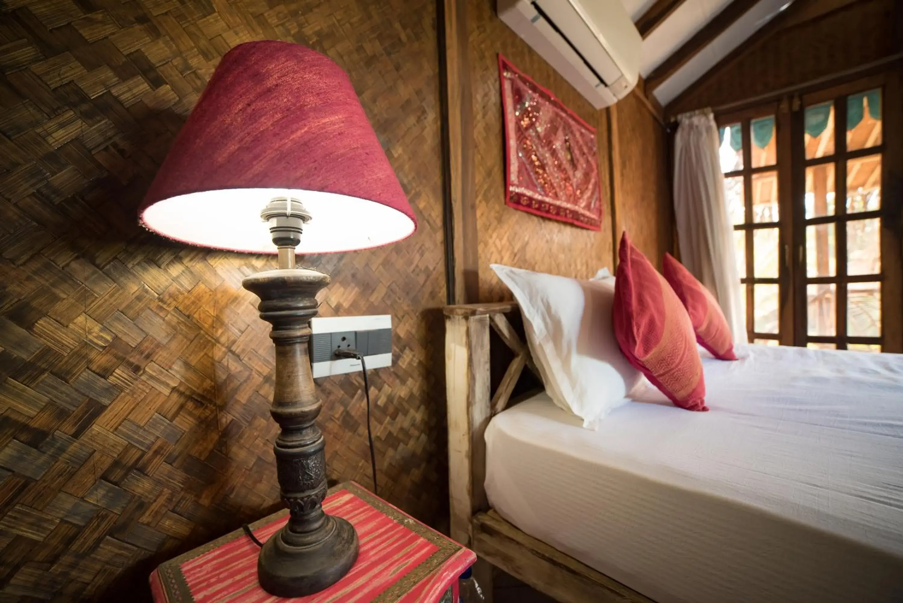 Decorative detail, Bed in Little India Beach Cottages Decorative detail, Bed in Little India Beach Cottages