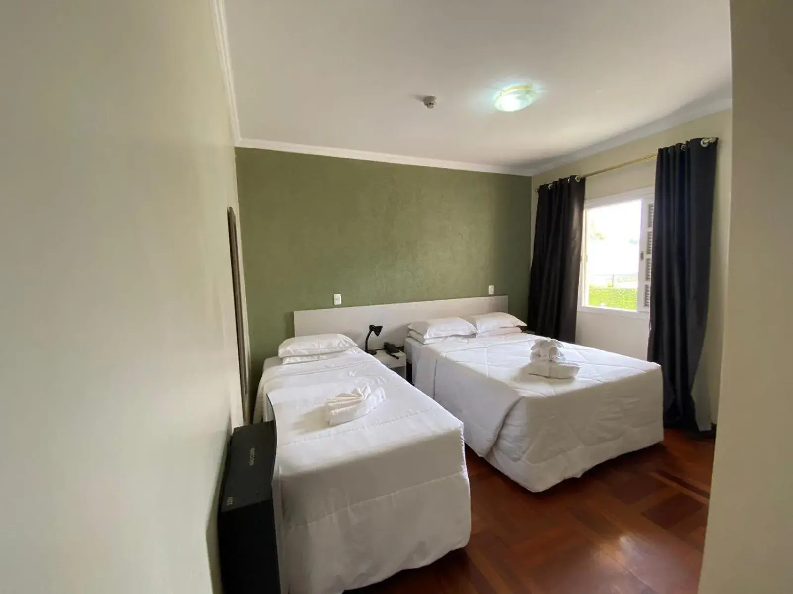 Standard Triple Room in Pousada Jordão Standard Triple Room in Pousada Jordão