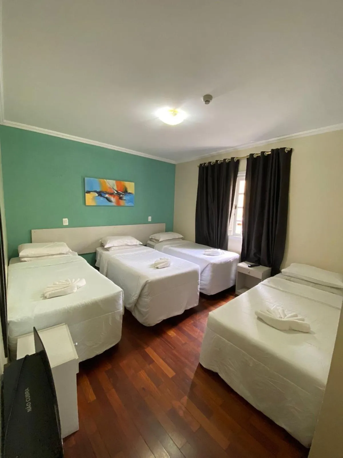 Bed in Pousada Jordão