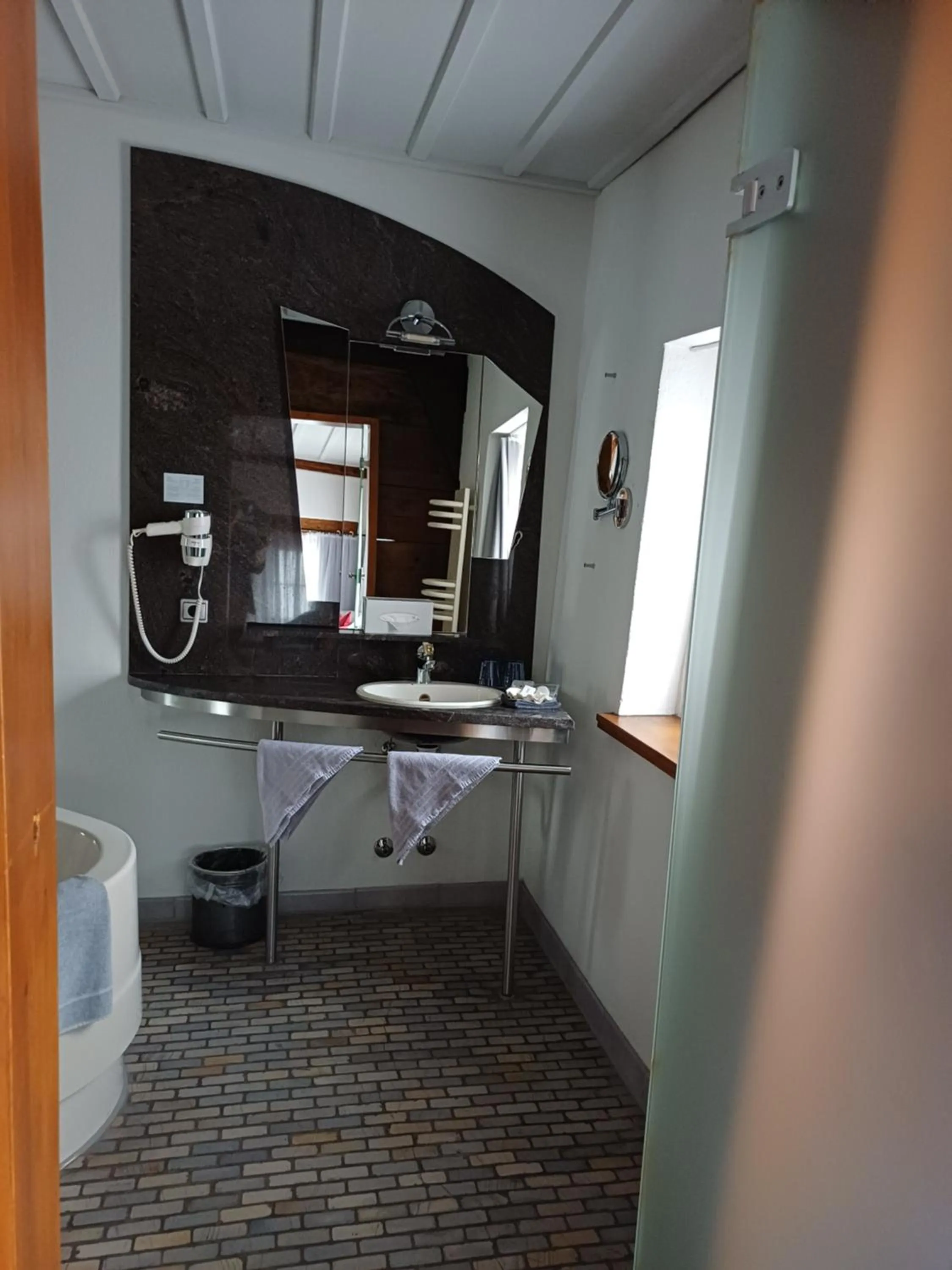 Bathroom in Schiefes Haus