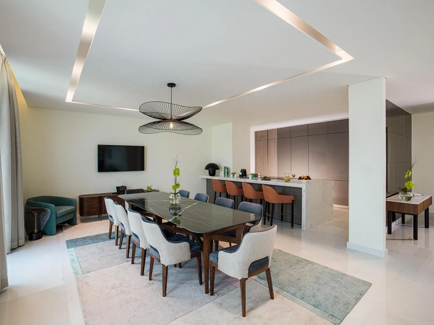 Communal lounge/ TV room in Th8 Palm Dubai Beach Resort, Vignette Collection by IHG