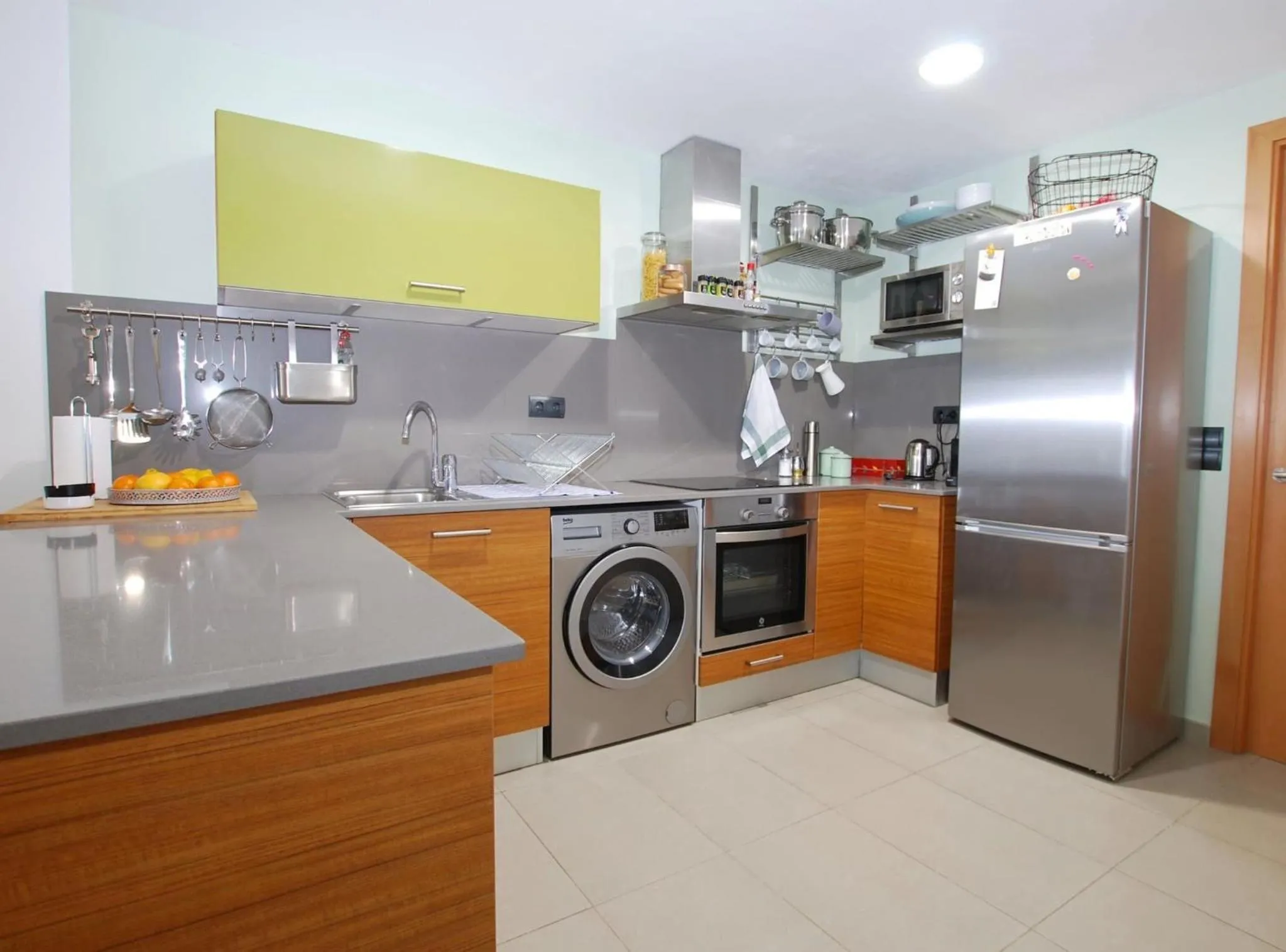 Kitchen or kitchenette in Petit niu · Petit niu · Apartamento AC - 3 min de la playa