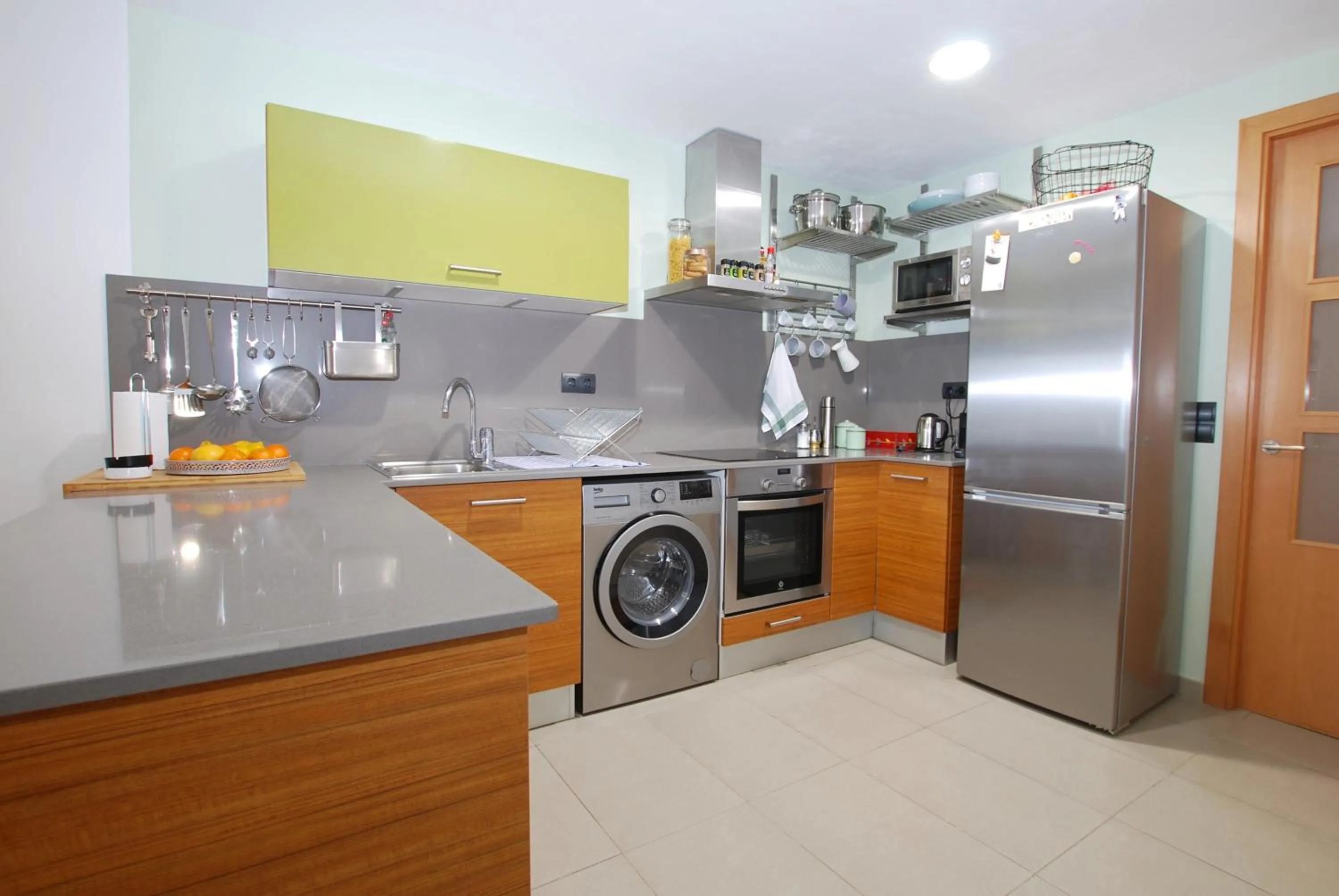 Kitchen or kitchenette in Petit niu · Petit niu · Apartamento AC - 3 min de la playa