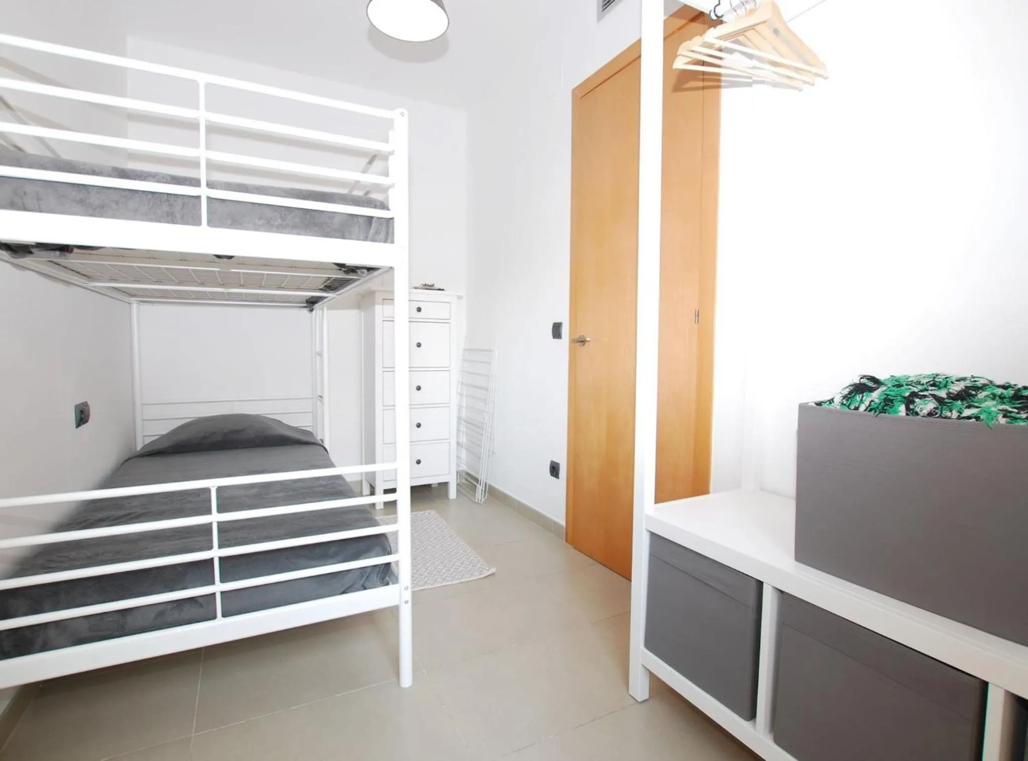 Bed in Petit niu · Petit niu · Apartamento AC - 3 min de la playa