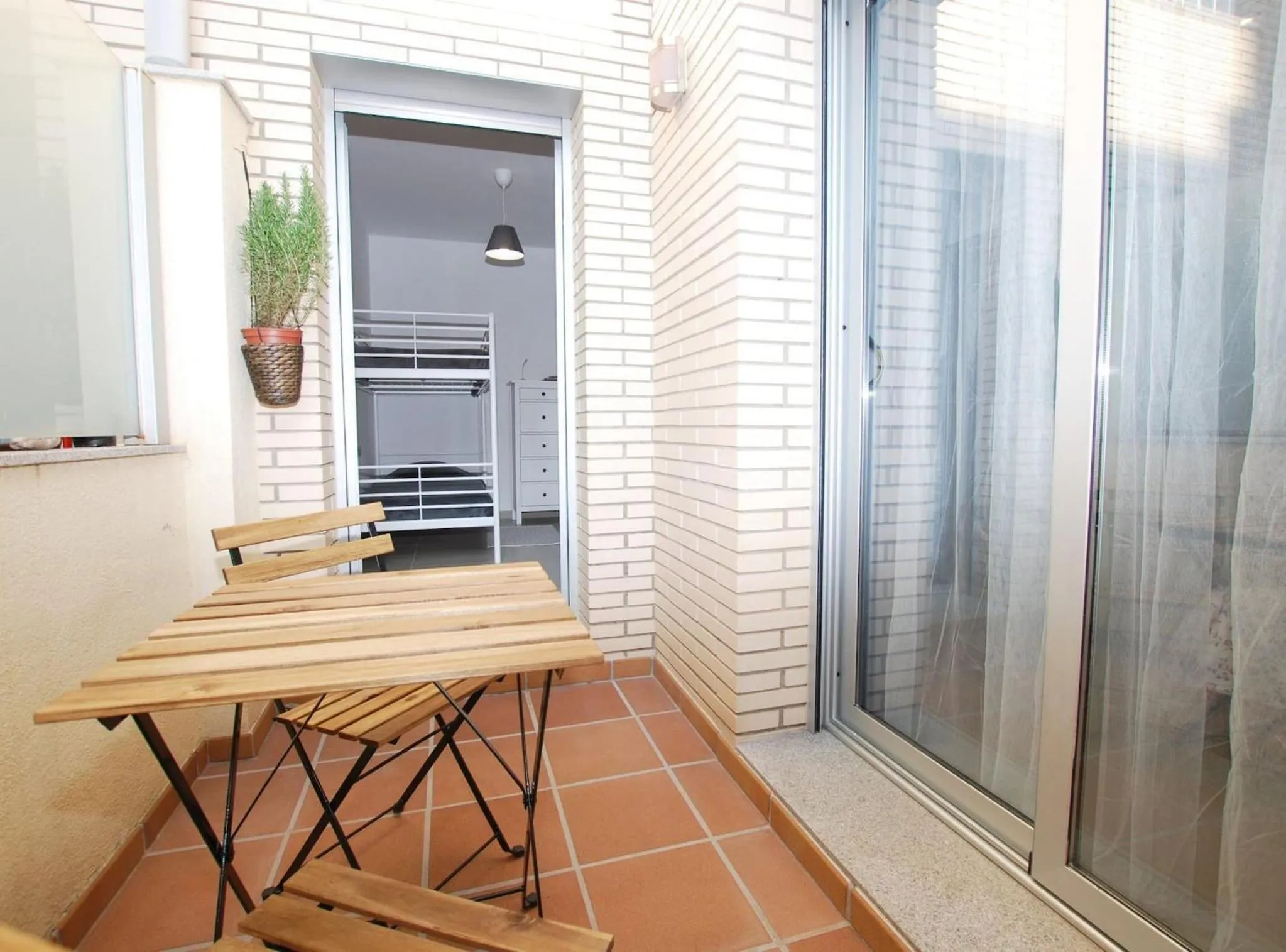 Balcony/Terrace in Petit niu · Petit niu · Apartamento AC - 3 min de la playa