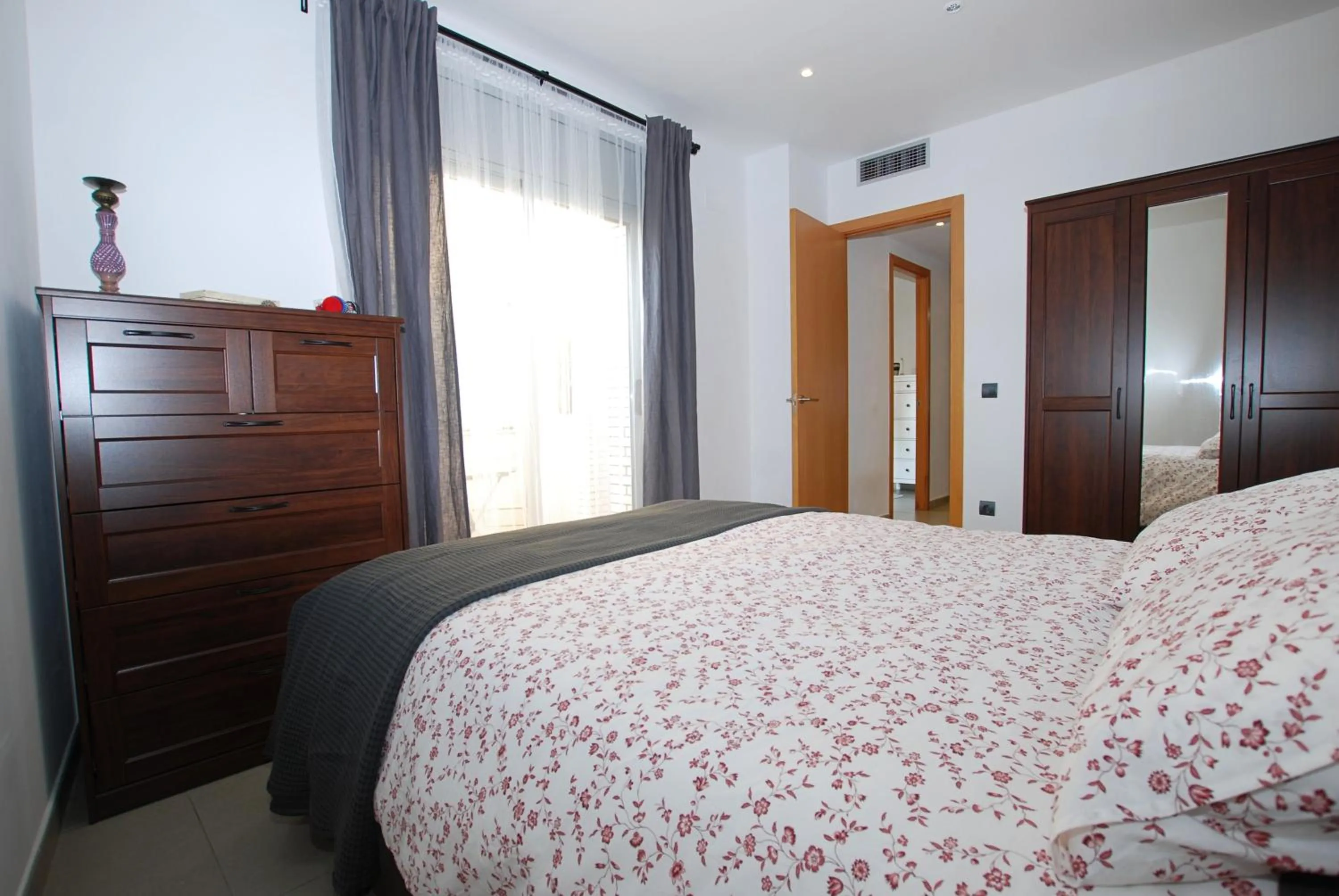 Bed in Petit niu · Petit niu · Apartamento AC - 3 min de la playa