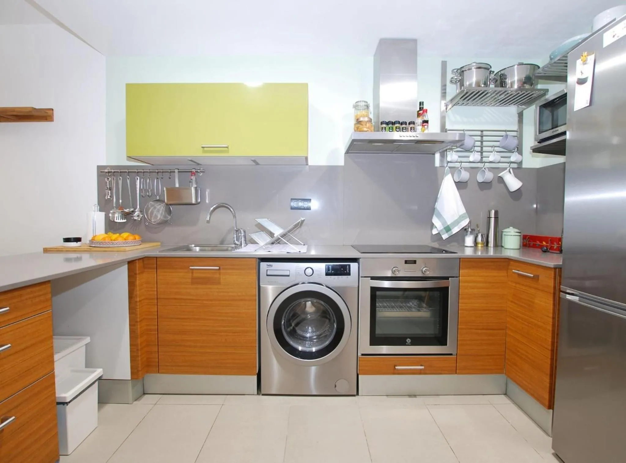 Kitchen or kitchenette in Petit niu · Petit niu · Apartamento AC - 3 min de la playa