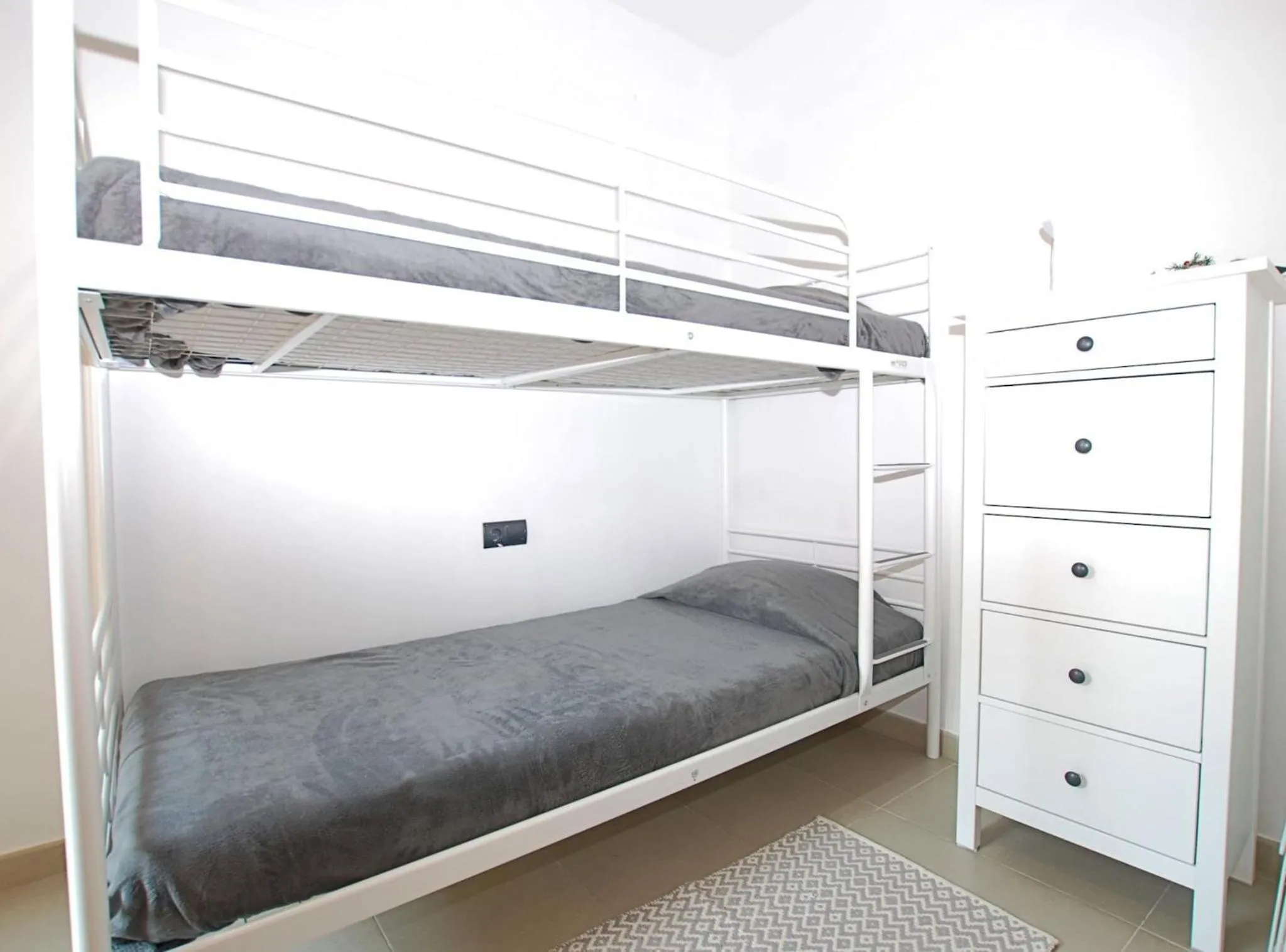 Bed in Petit niu · Petit niu · Apartamento AC - 3 min de la playa