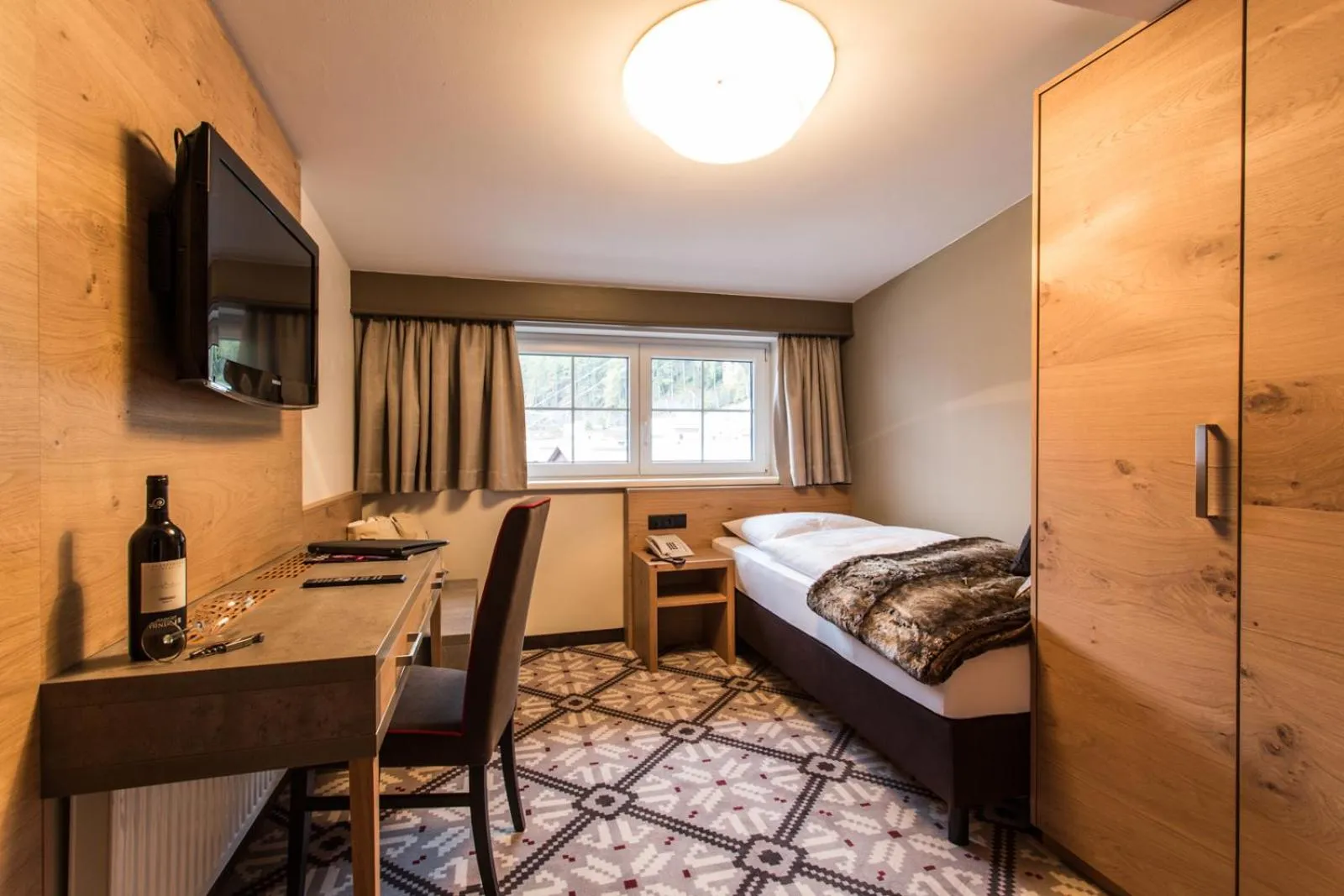 Seating area, Bed in Hotel Valentin